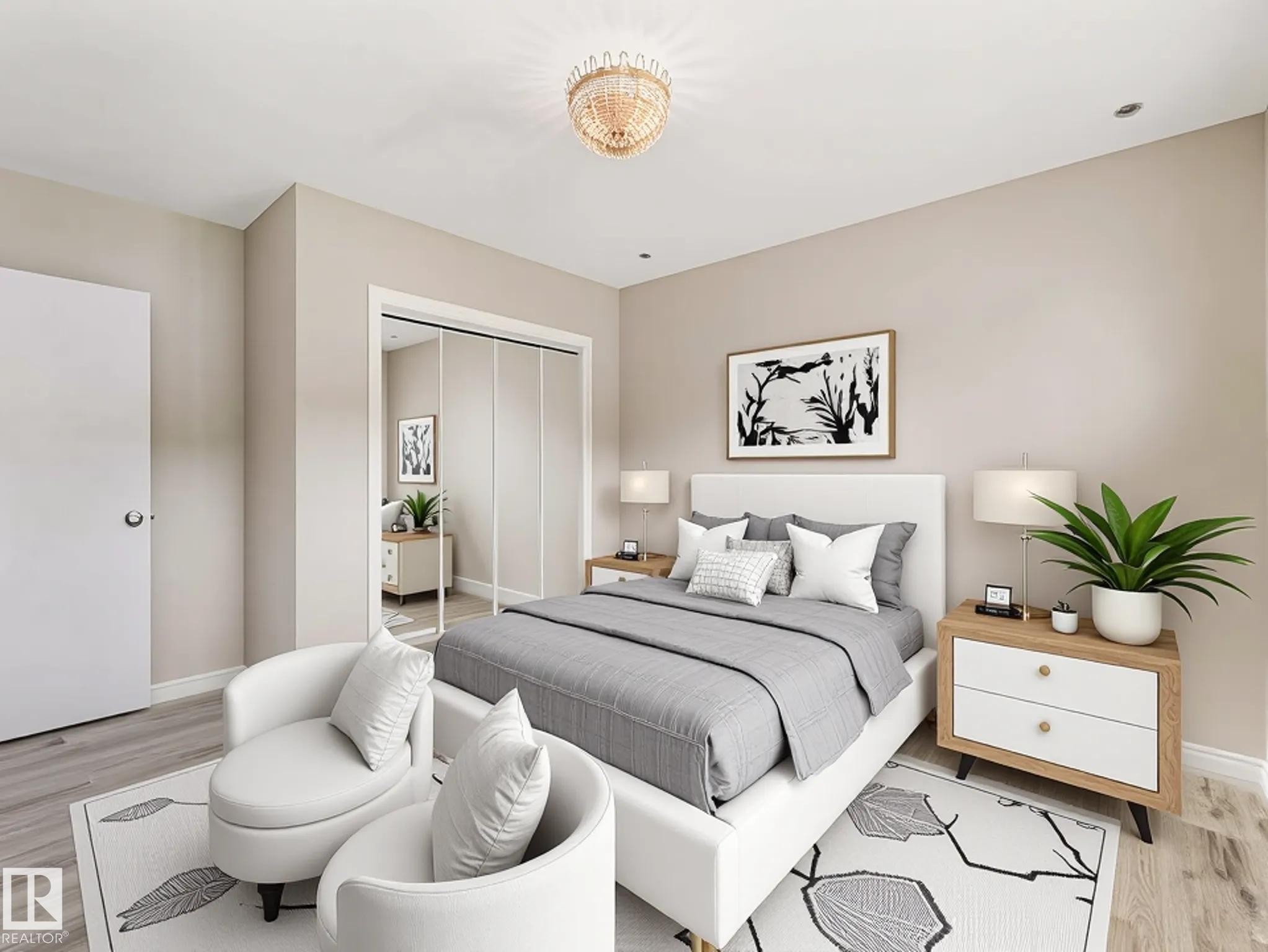 Recessed lighting with a decorative chandelier, light wood-finish flooring, and mirrored closet doors - 15916 88B Avenue Nw, Edmonton, AB