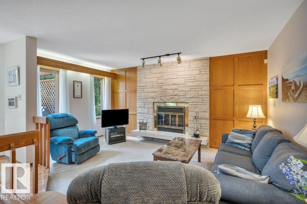 1403 69 Street Nw, Edmonton, AB - Indoor Photo Showing Living Room With Fireplace