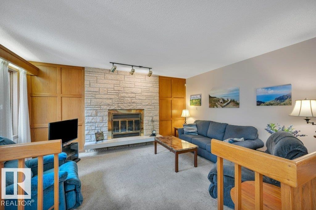 1403 69 Street Nw, Edmonton, AB - Indoor Photo Showing Living Room With Fireplace