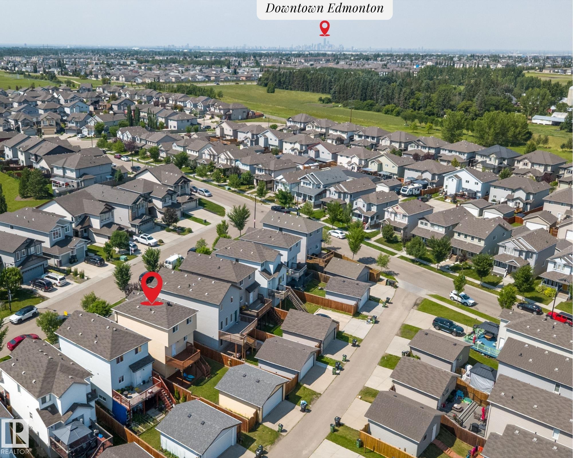 Residential neighborhood setting with varied architectural styles and mature landscaping - 2803 12 Street Nw, Edmonton, AB