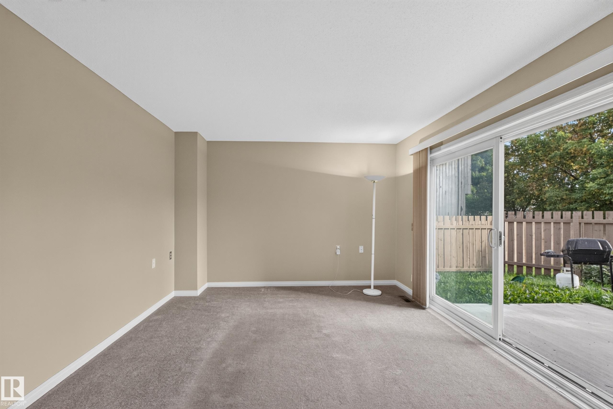 Carpeted interior space with neutral wall tones - 17749 95 Street Nw, Edmonton, AB