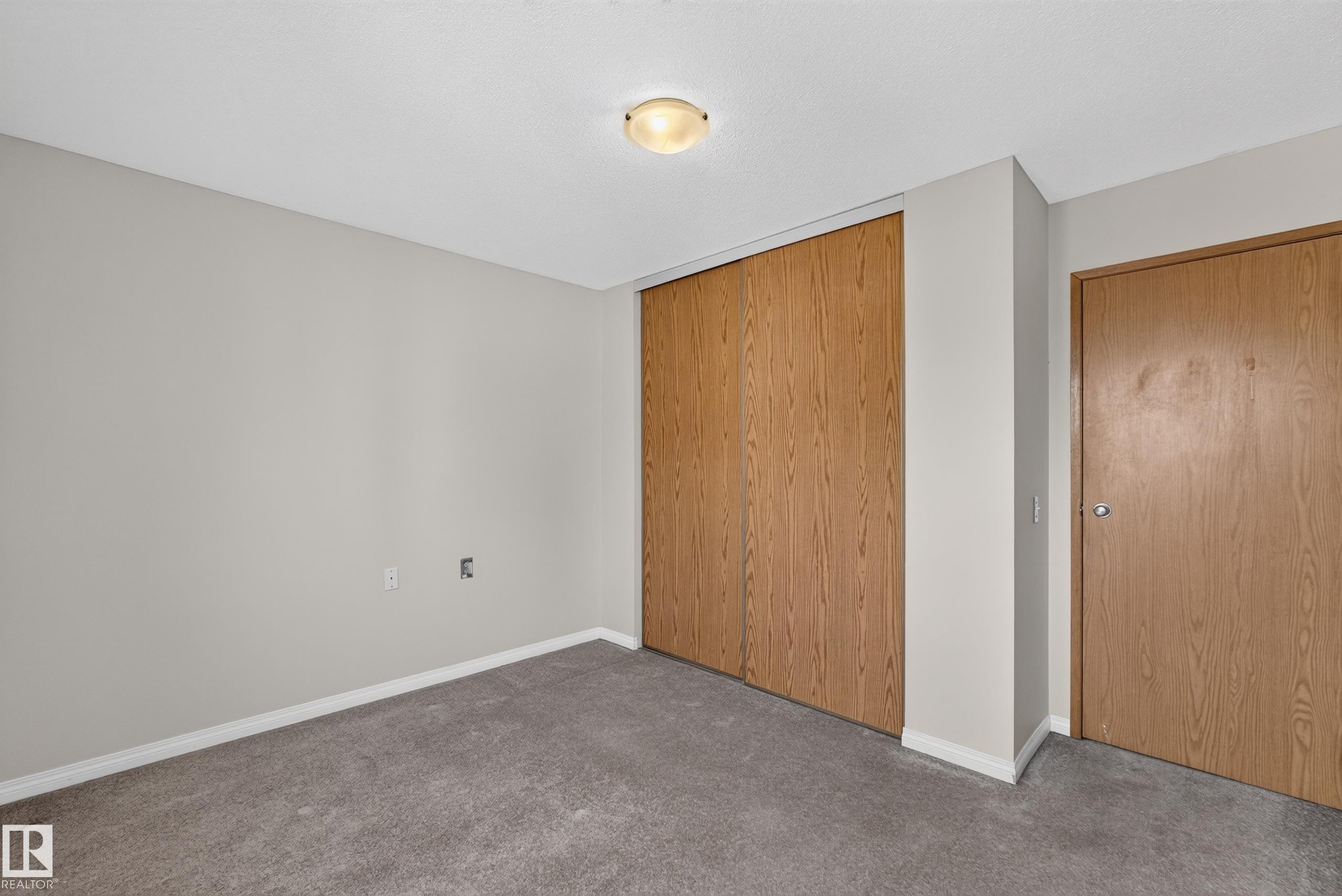 Wall-to-wall carpeting and neutral wall finishes - 17749 95 Street Nw, Edmonton, AB