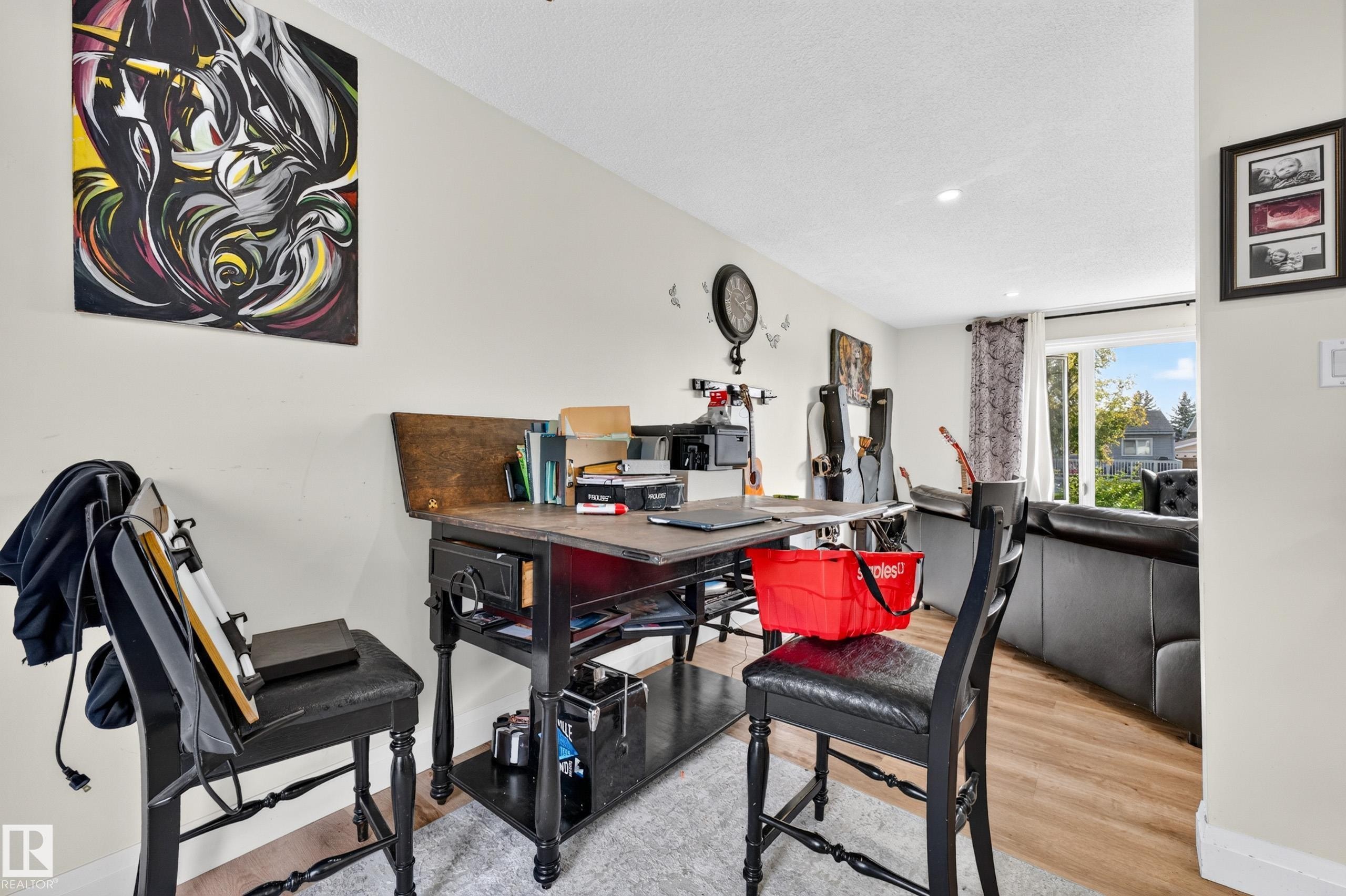 Light-toned walls with recessed lighting throughout - 2412 80 Street Nw, Edmonton, AB