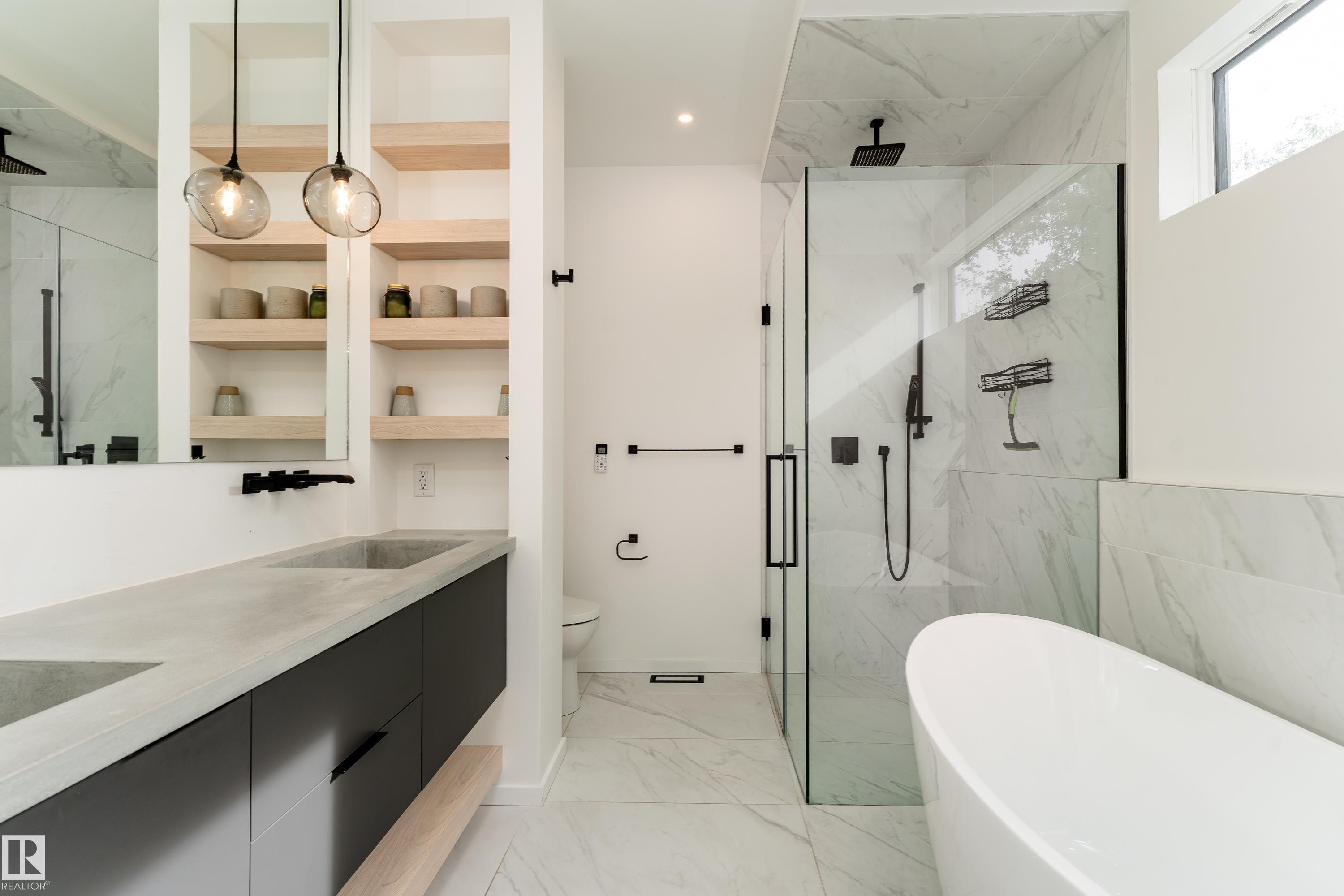 Dual concrete-finish sinks with black cabinetry - 10138 90 Street Nw, Edmonton, AB