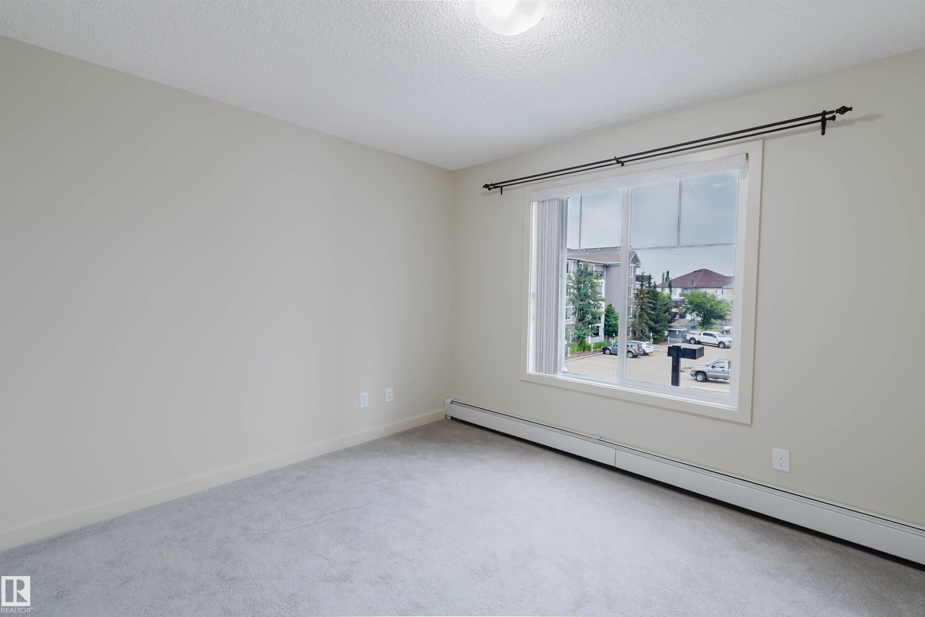 Empty room - #304 6084 Stanton Dr Sw, Edmonton, AB - Indoor Photo Showing Other Room