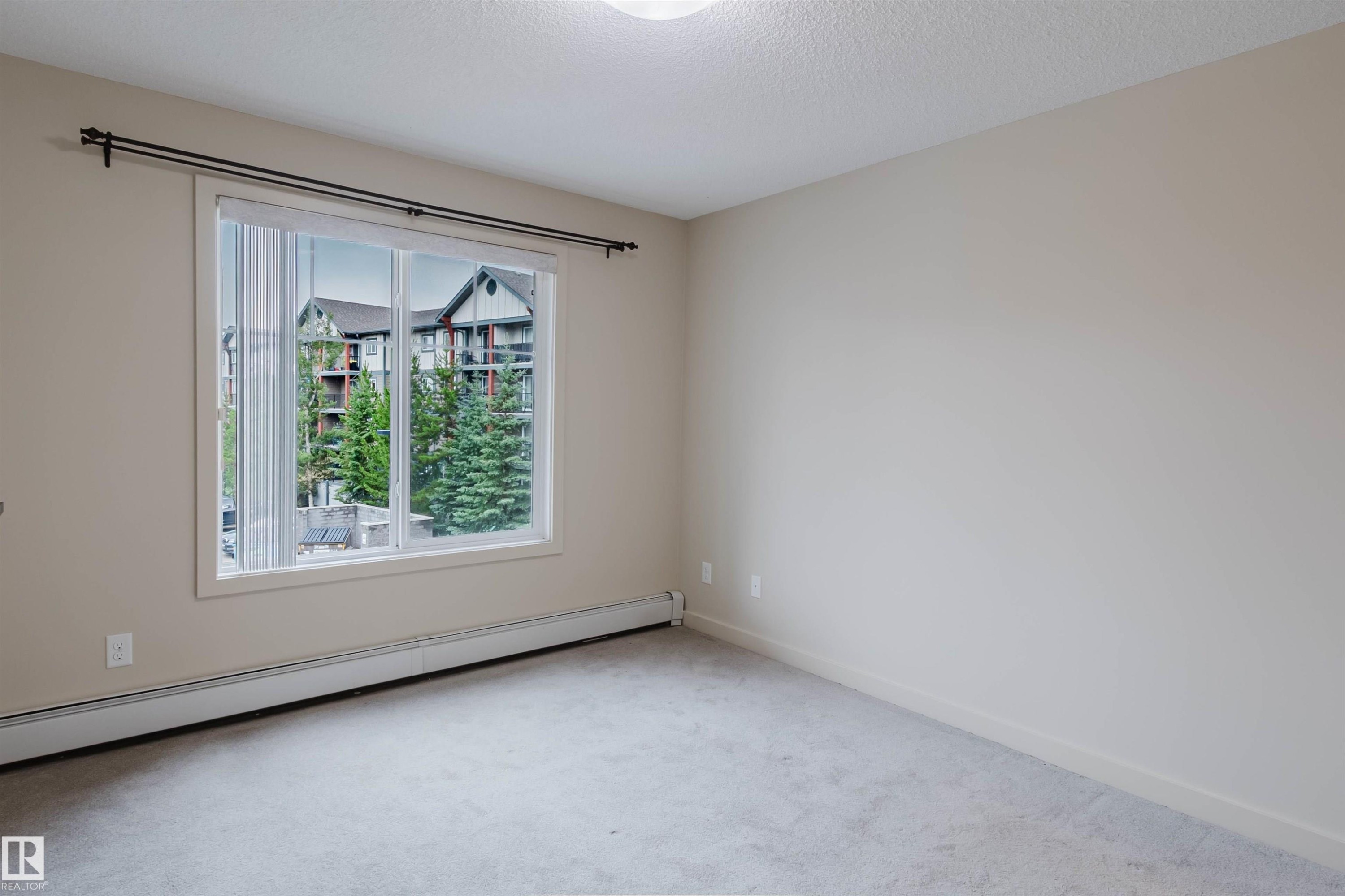 Empty room - #304 6084 Stanton Dr Sw, Edmonton, AB - Indoor Photo Showing Other Room