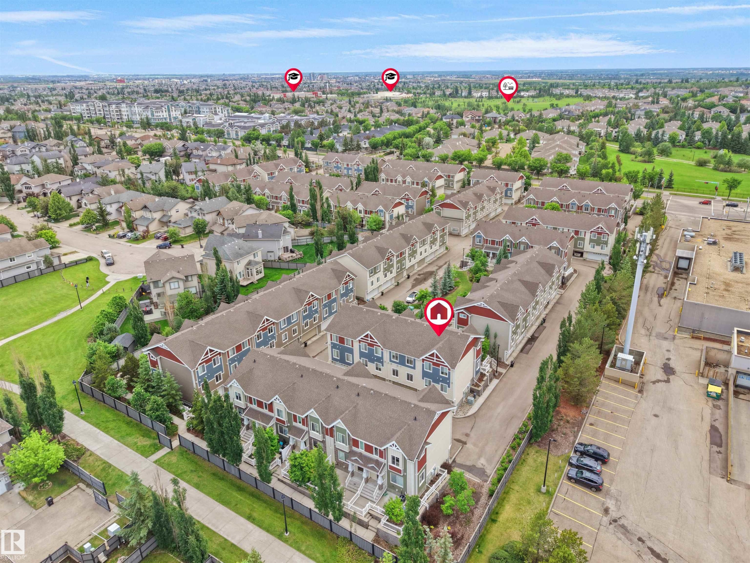 Aerial perspective showcasing a residential community with multi-level townhomes - #40 2003 Rabbit Hill Rd Nw, Edmonton, AB