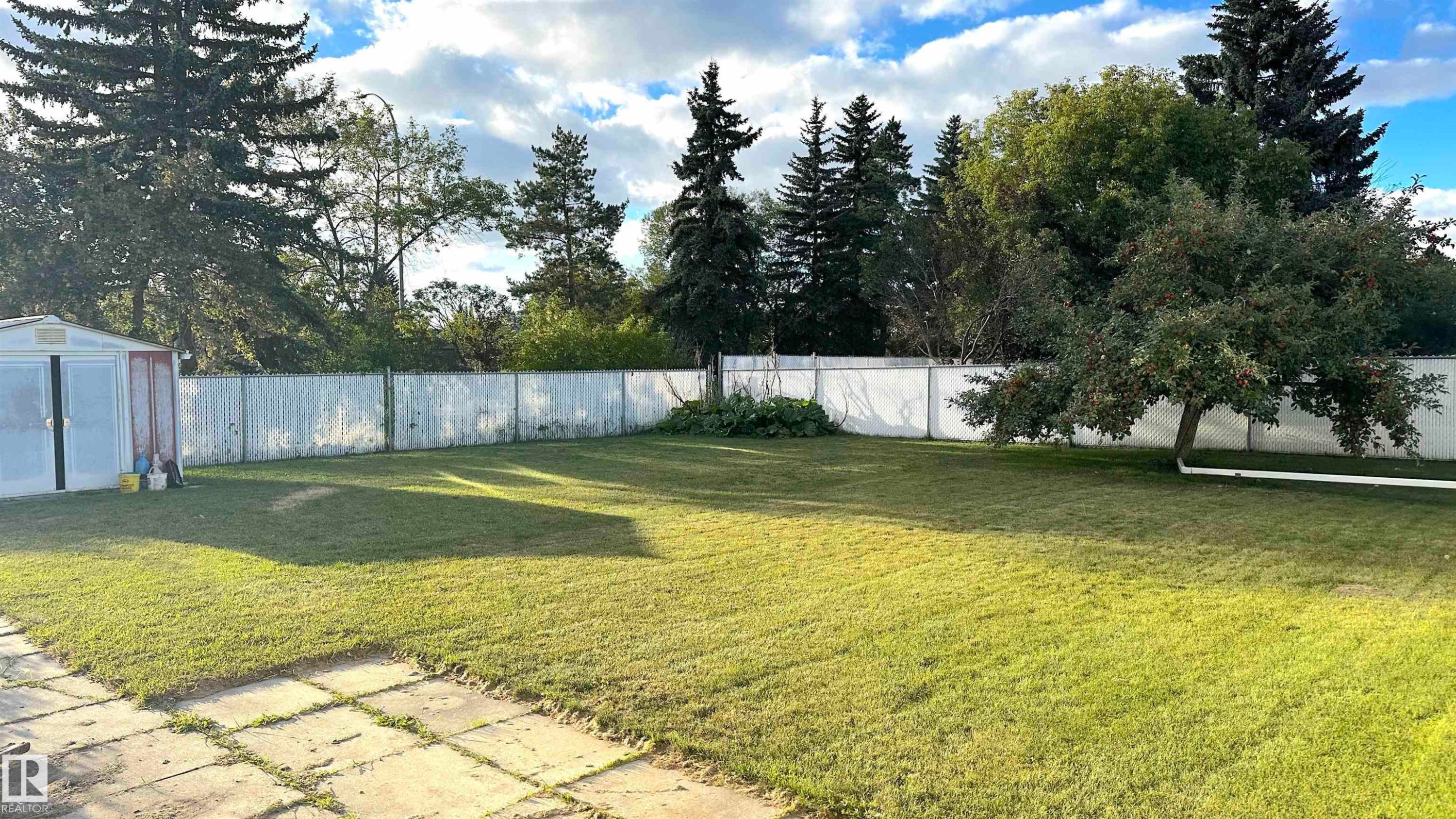 With maintenance free chain link fencing and access to the walking trail. - 4128 110 Street Nw, Edmonton, AB