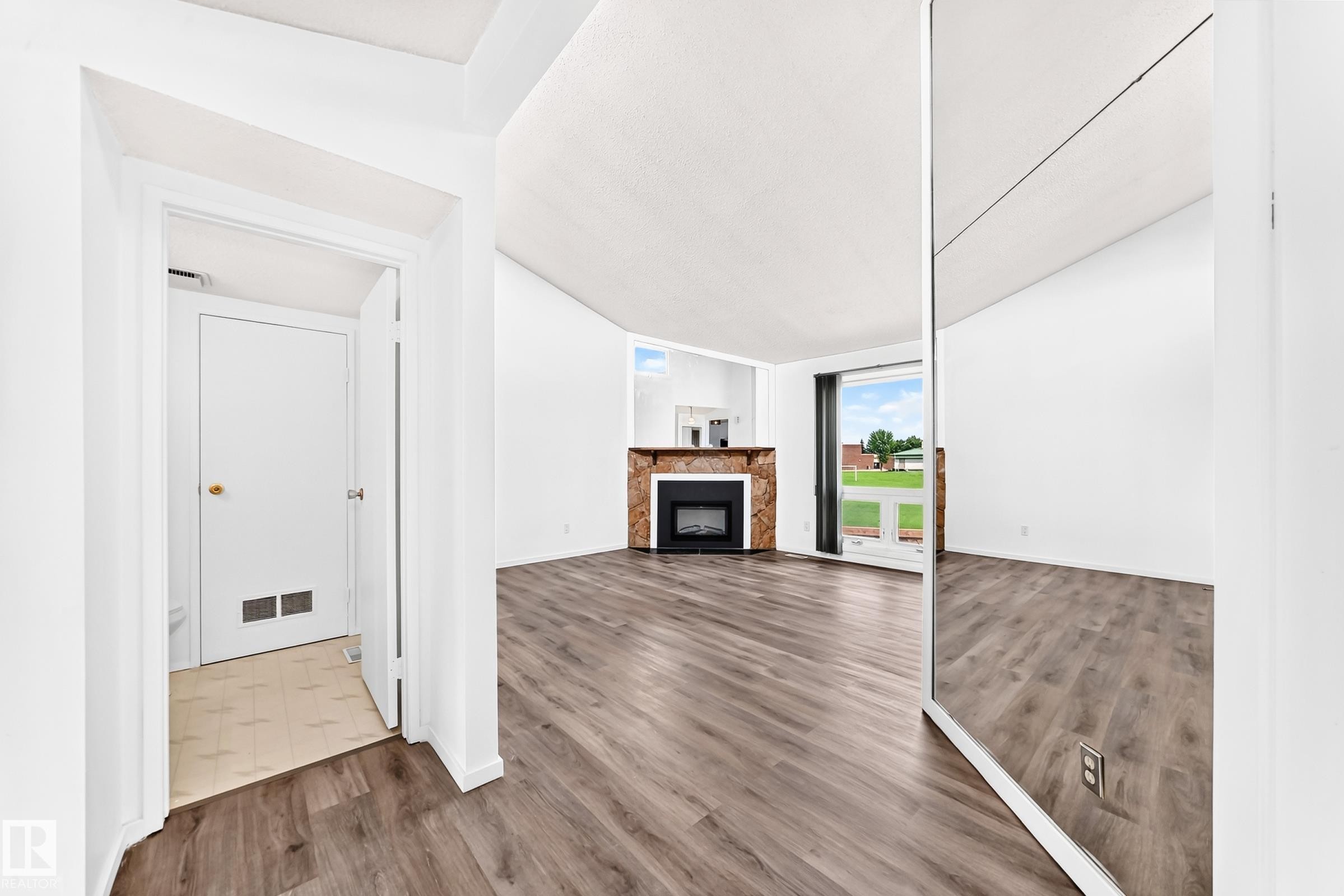 14141 26 Street Nw, Edmonton, AB - Indoor With Fireplace