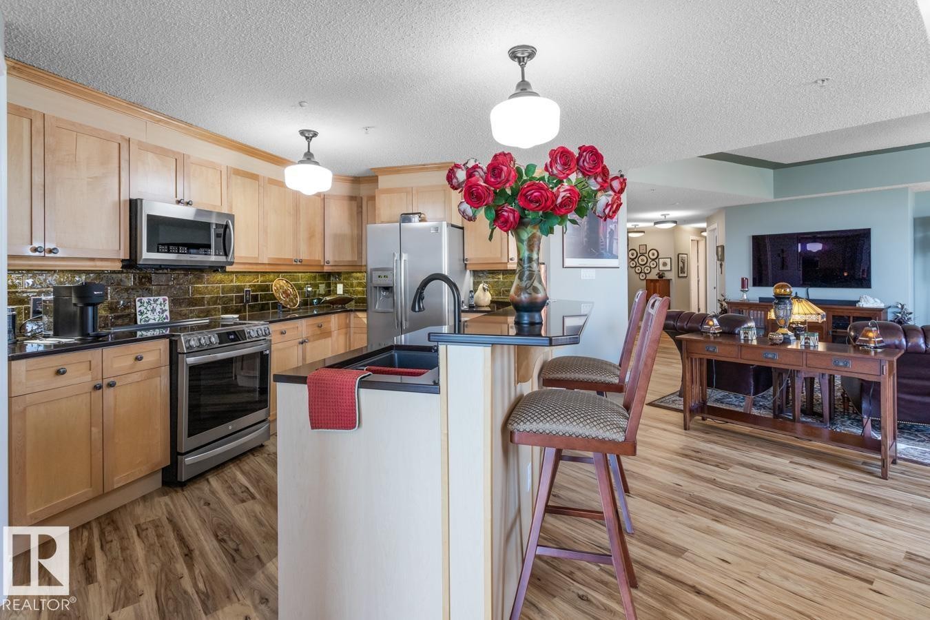 #1103 9020 Jasper Av Nw, Edmonton, AB - Indoor Photo Showing Kitchen With Stainless Steel Kitchen