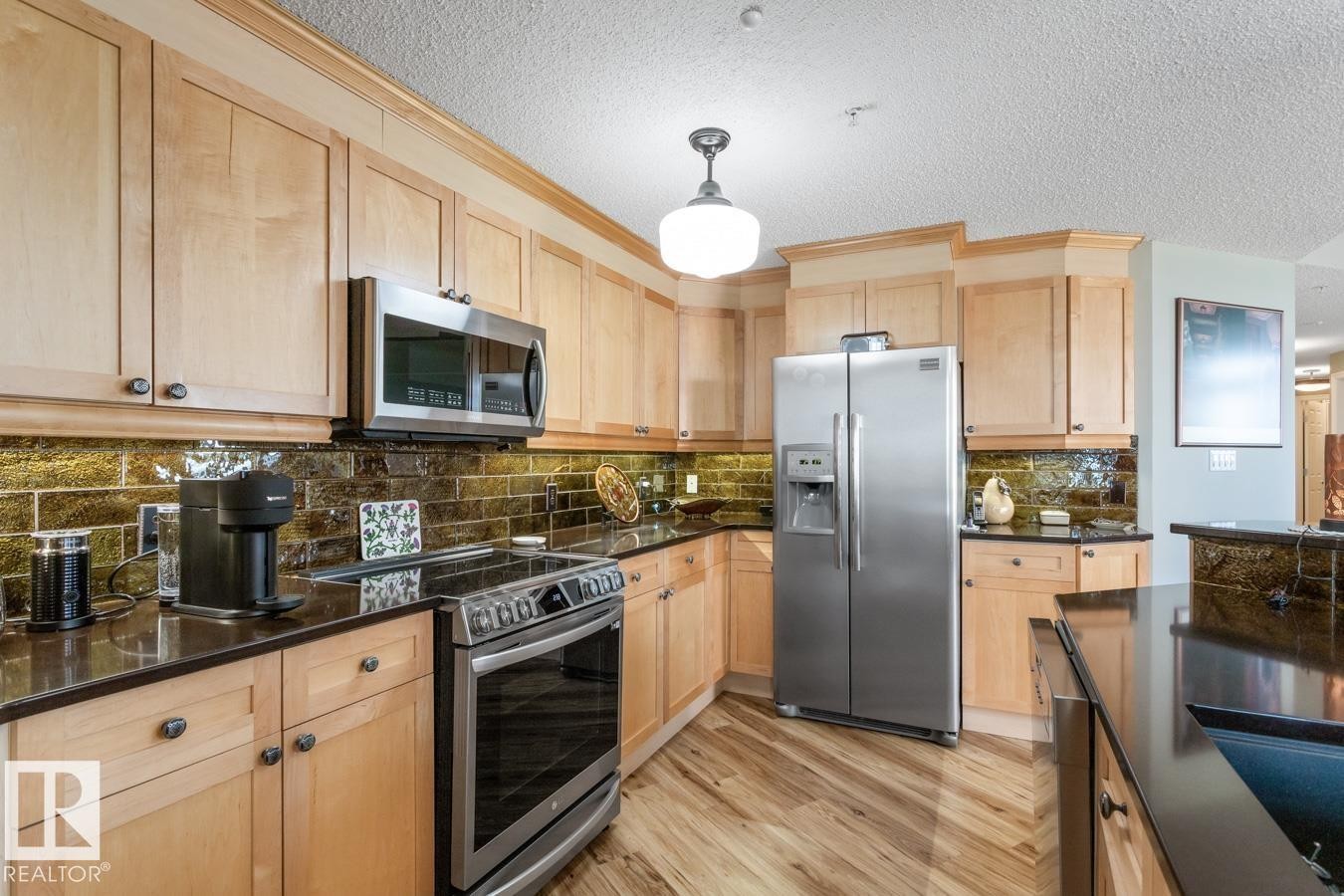 #1103 9020 Jasper Av Nw, Edmonton, AB - Indoor Photo Showing Kitchen With Stainless Steel Kitchen
