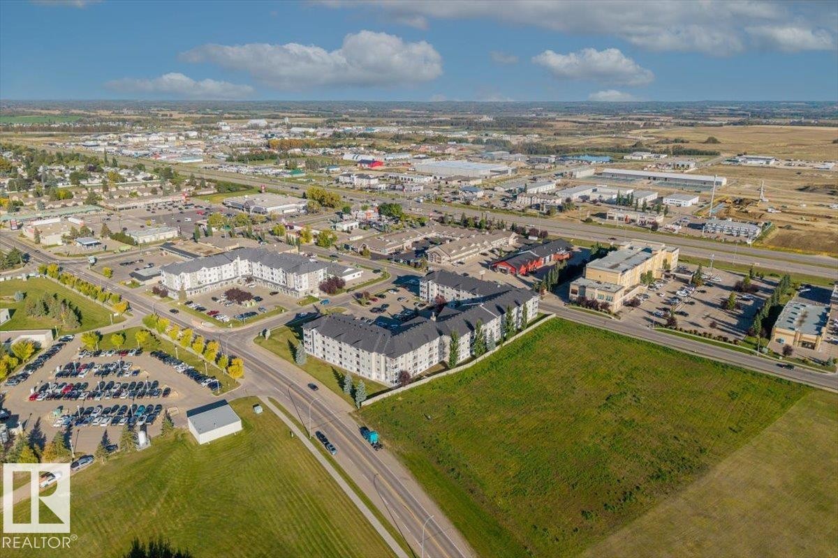 Expansive open land with direct road frontage - #110 4309 33 St, Stony Plain, AB
