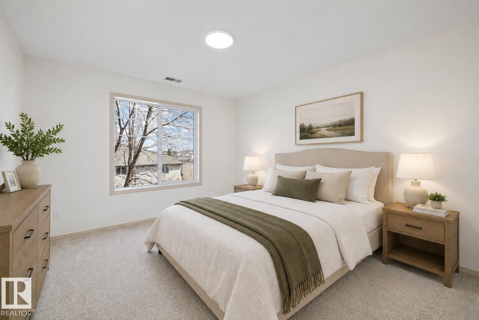 Light-colored carpeting and white walls complement the large window with white framing (virtually staged) - #353 2096 Blackmud Creek Dr Sw, Edmonton, AB - Indoor Photo Showing Bedroom