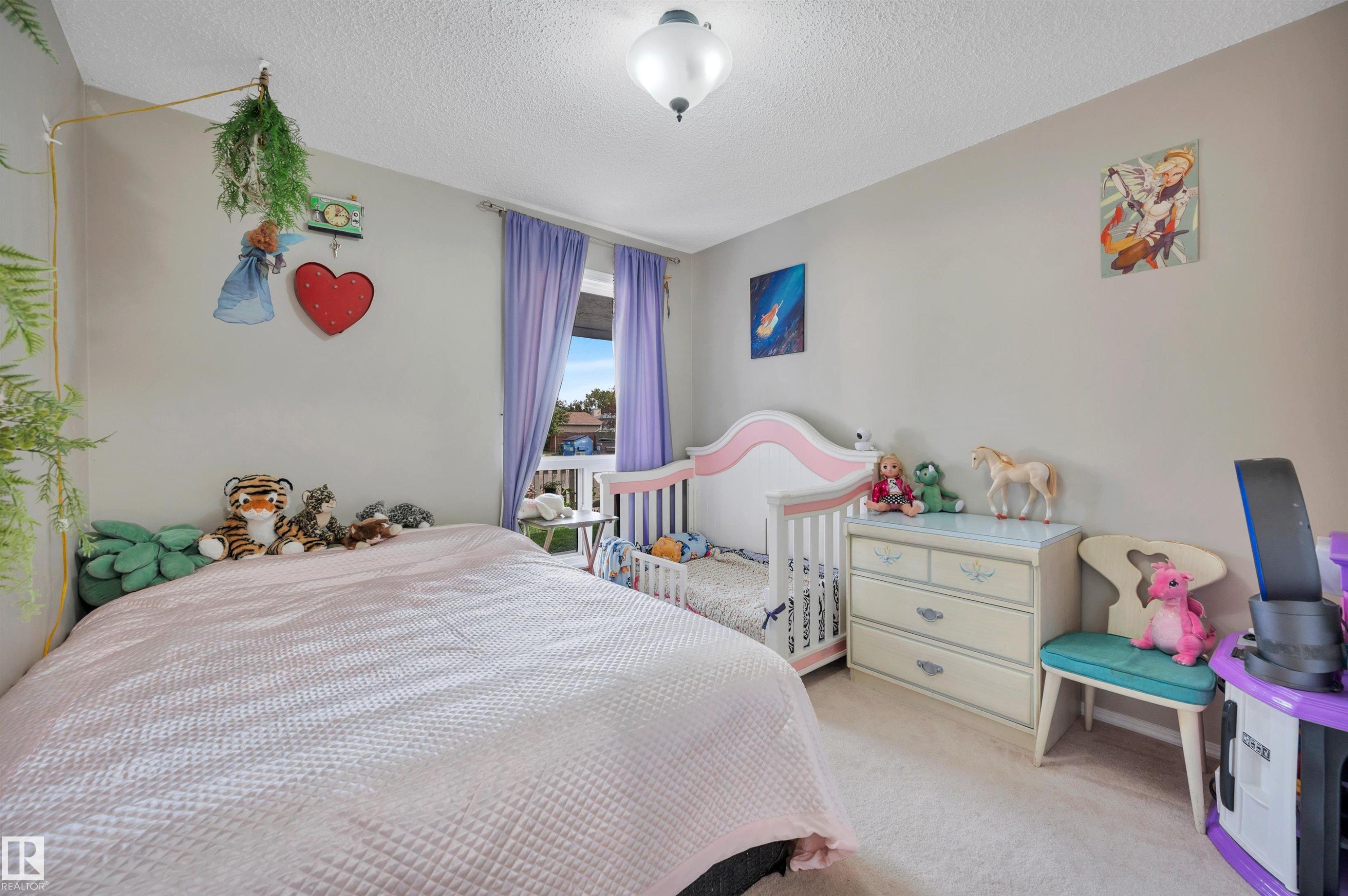 Wall-to-wall carpeting and neutral wall paint - 15017 26 Street Nw, Edmonton, AB
