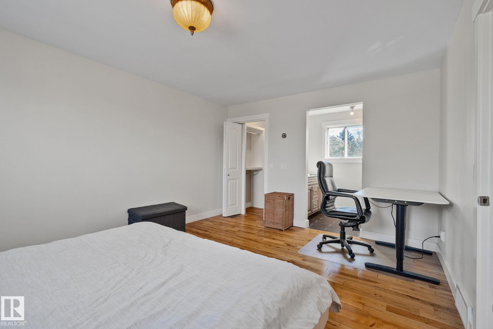 Hardwood flooring, recessed lighting, and a closet with bifold doors - 12403 29A Avenue Nw, Edmonton, AB