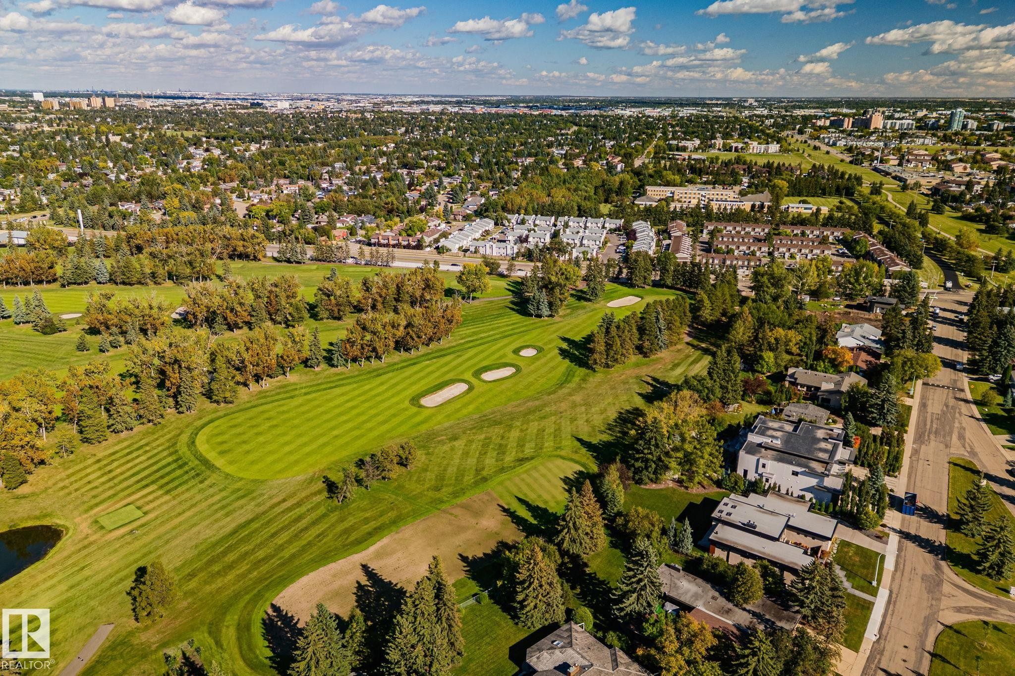 Expansive golf course frontage with manicured greens and sand traps - 12403 29A Avenue Nw, Edmonton, AB