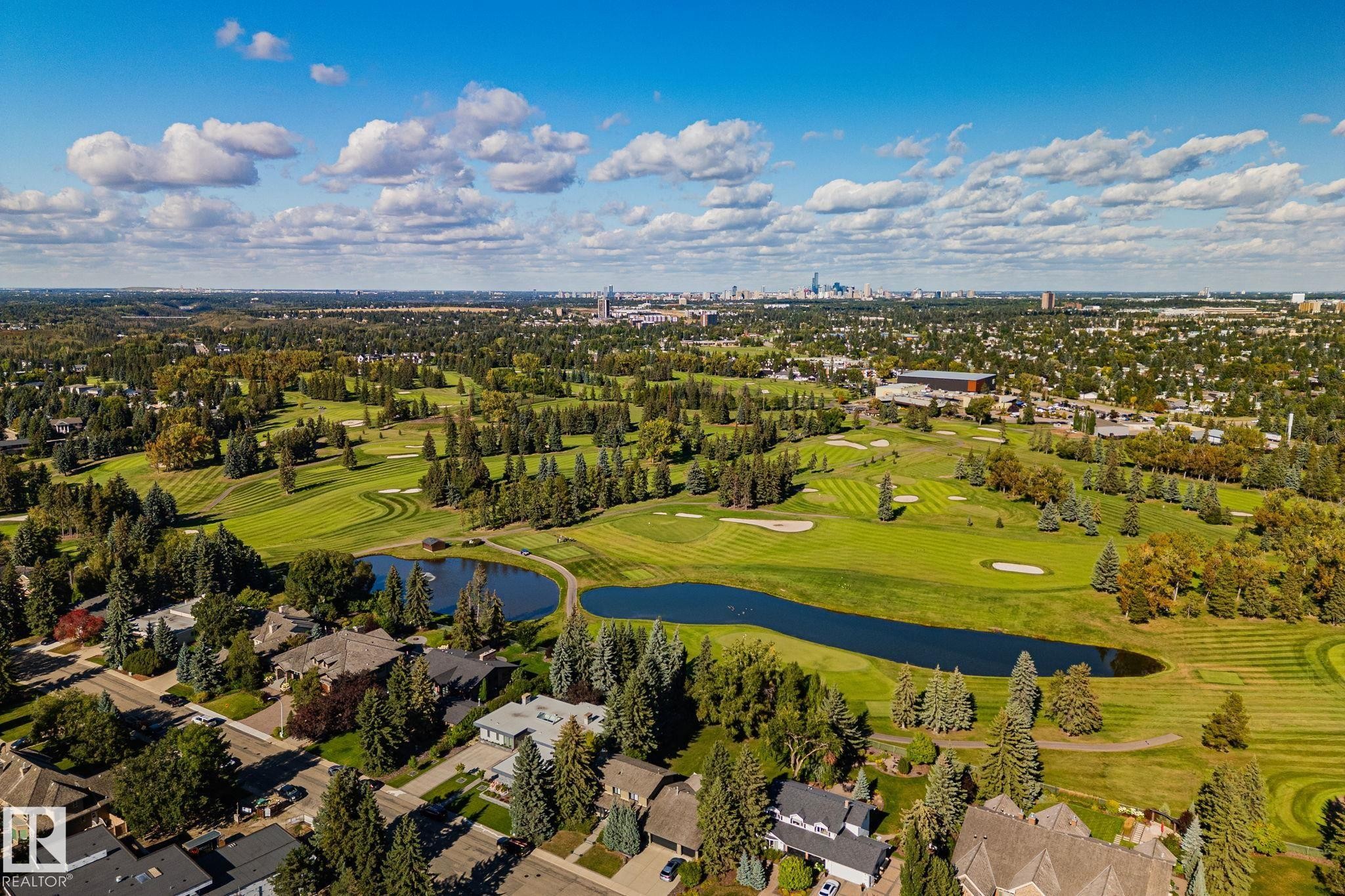 Expansive golf course setting featuring lush green fairways and water features - 12403 29A Avenue Nw, Edmonton, AB