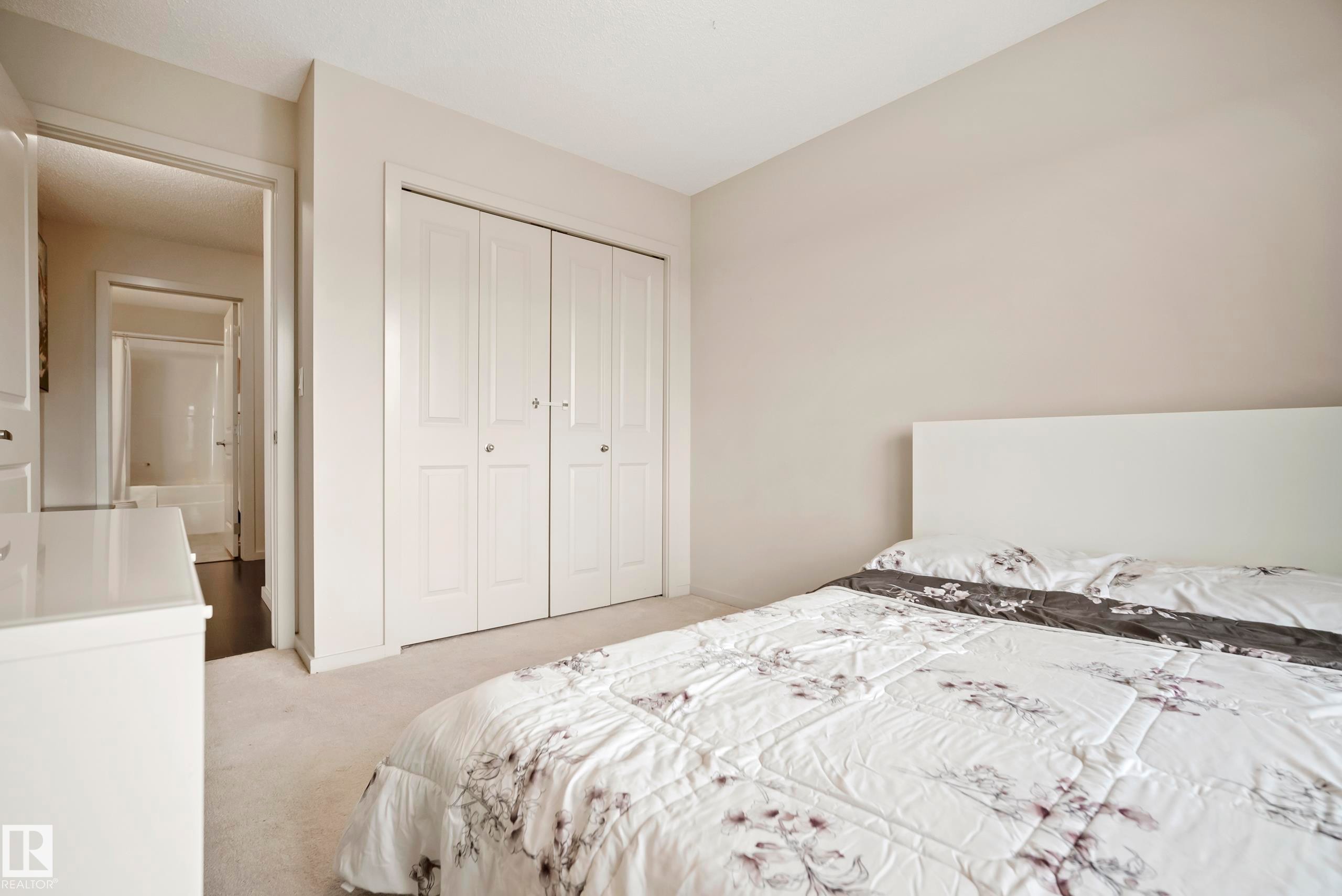 Neutral wall tones with soft carpeting - #419 5515 7 Av Sw, Edmonton, AB
