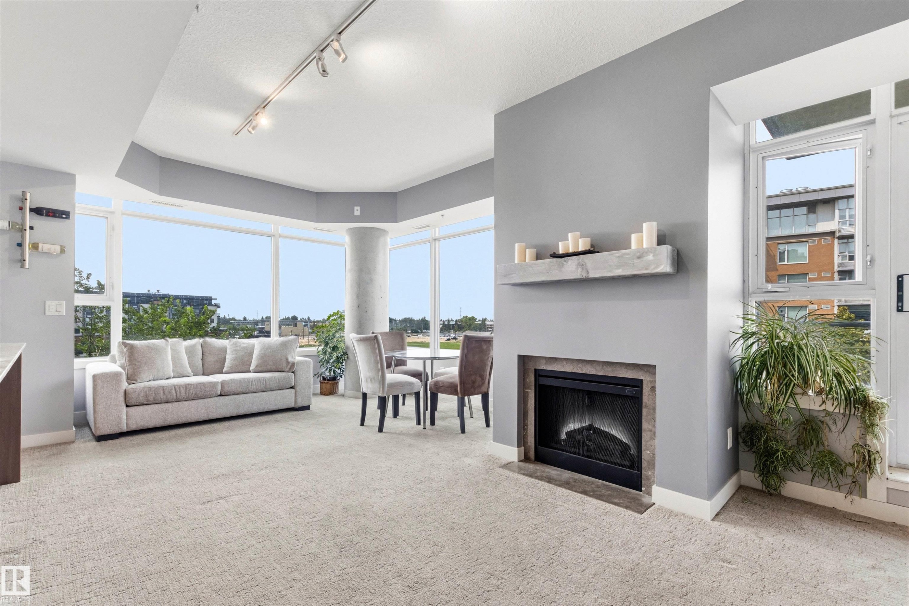 #406 2504 109 St Nw, Edmonton, AB - Indoor Photo Showing Living Room With Fireplace