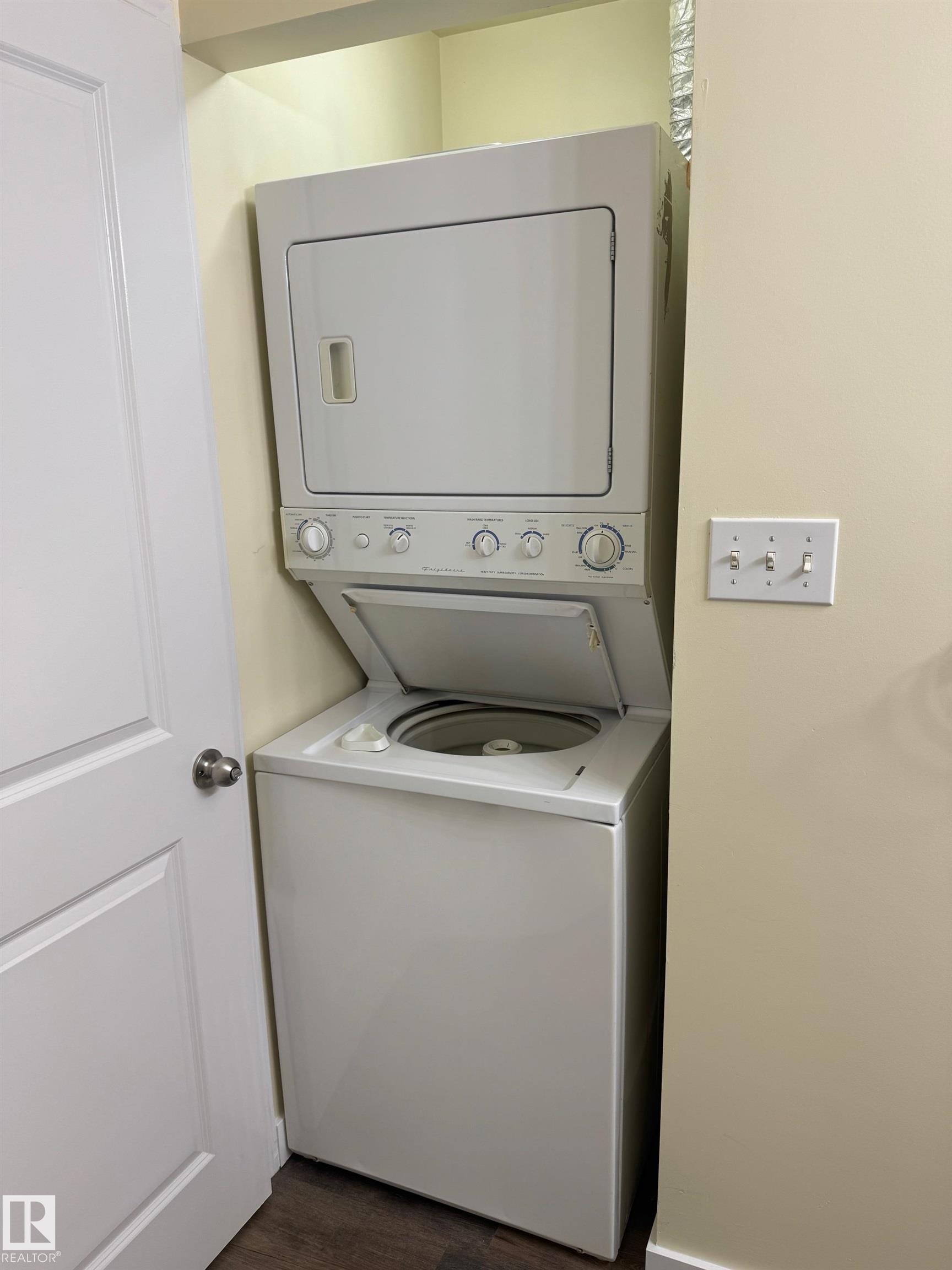 Stackable laundry appliances within a dedicated alcove - #229 2305 35A Av Nw, Edmonton, AB