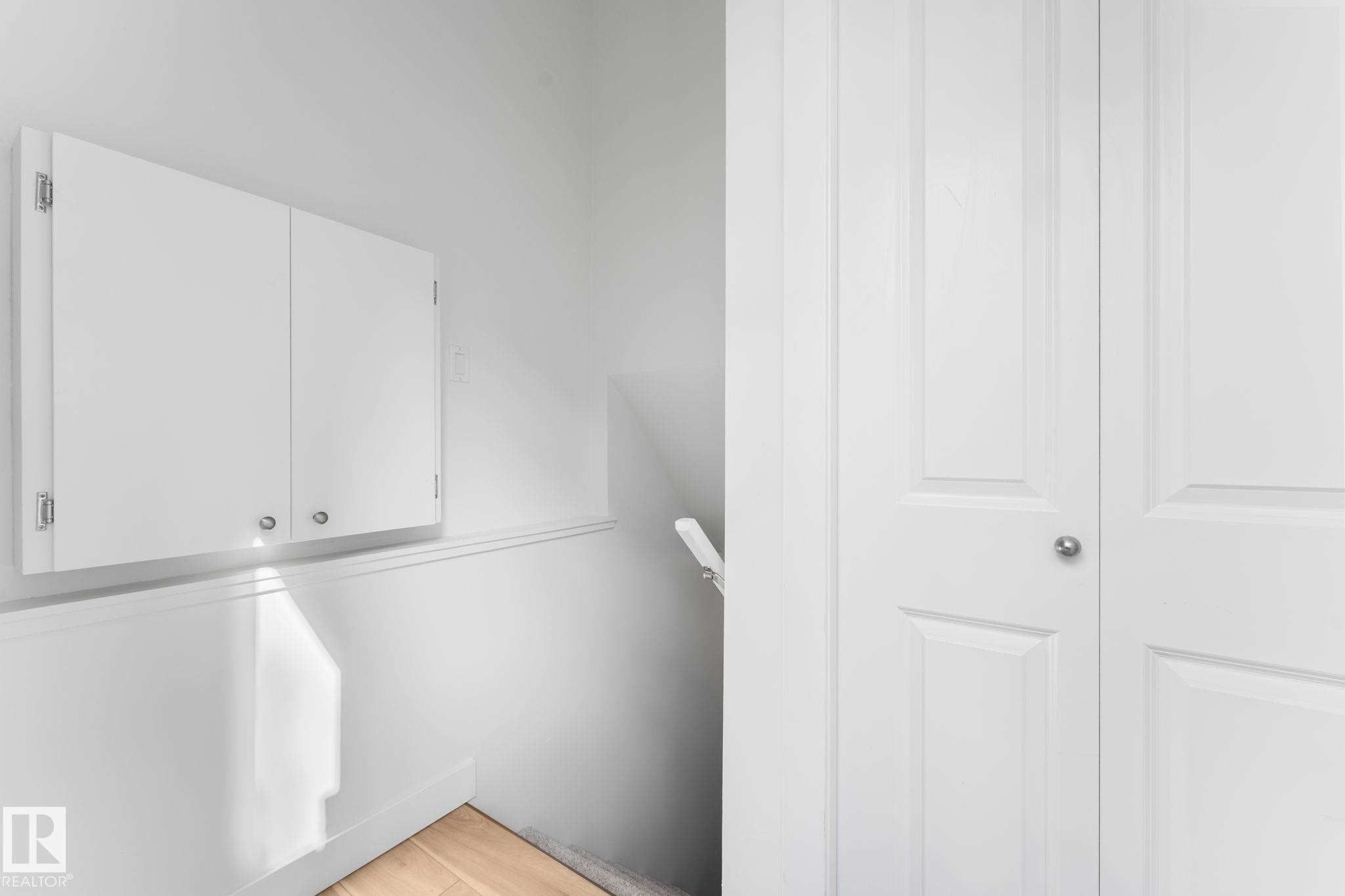Closet and main entry for basement suite - 6108 102 Avenue Nw, Edmonton, AB