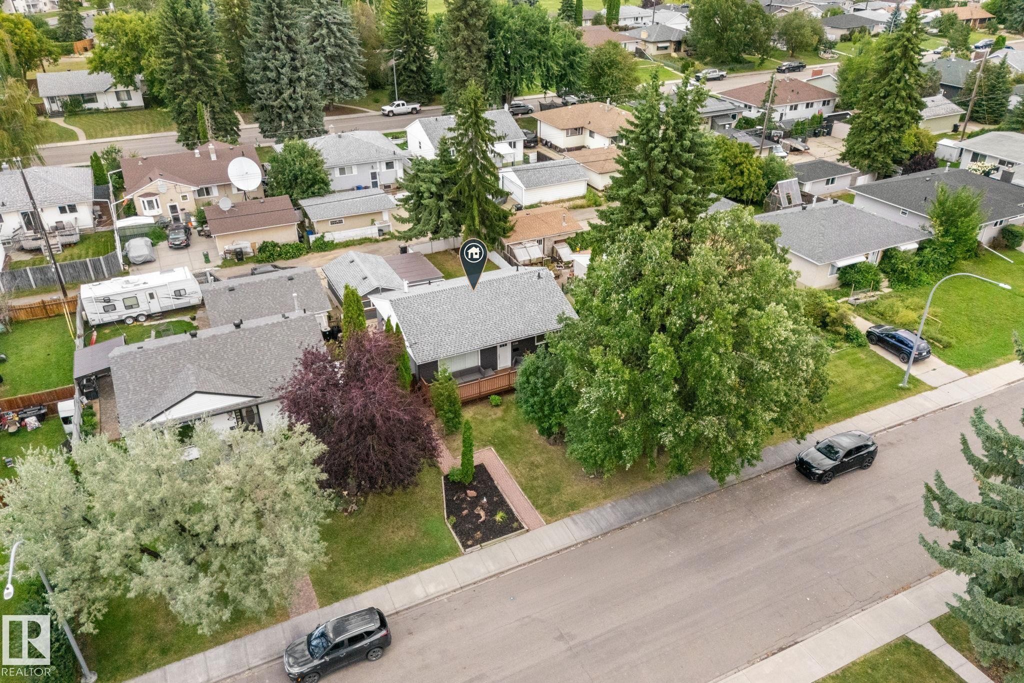 Residential property with mature trees and established landscaping - 6108 102 Avenue Nw, Edmonton, AB