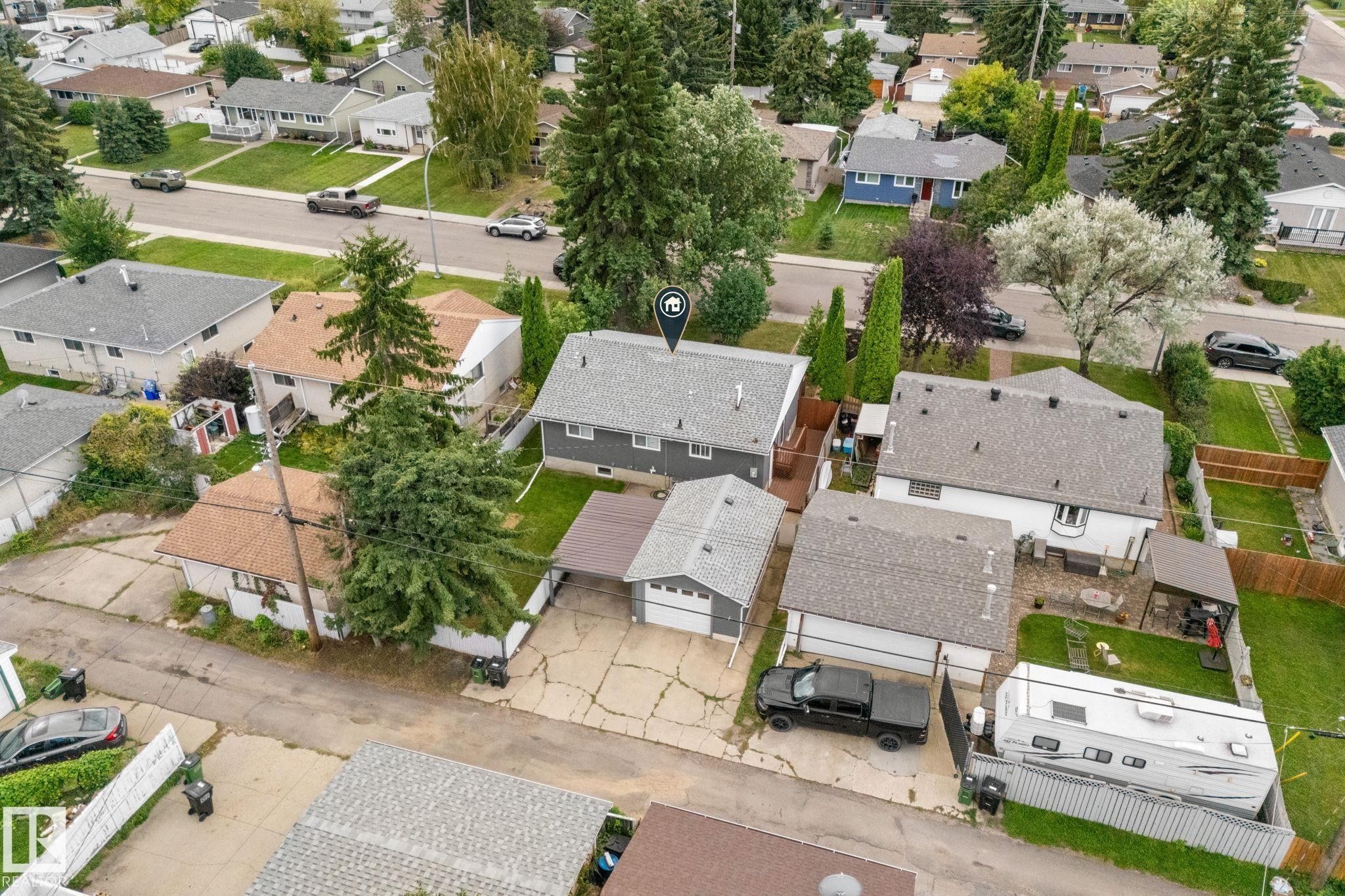 Residential property with mature trees and established landscaping - 6108 102 Avenue Nw, Edmonton, AB