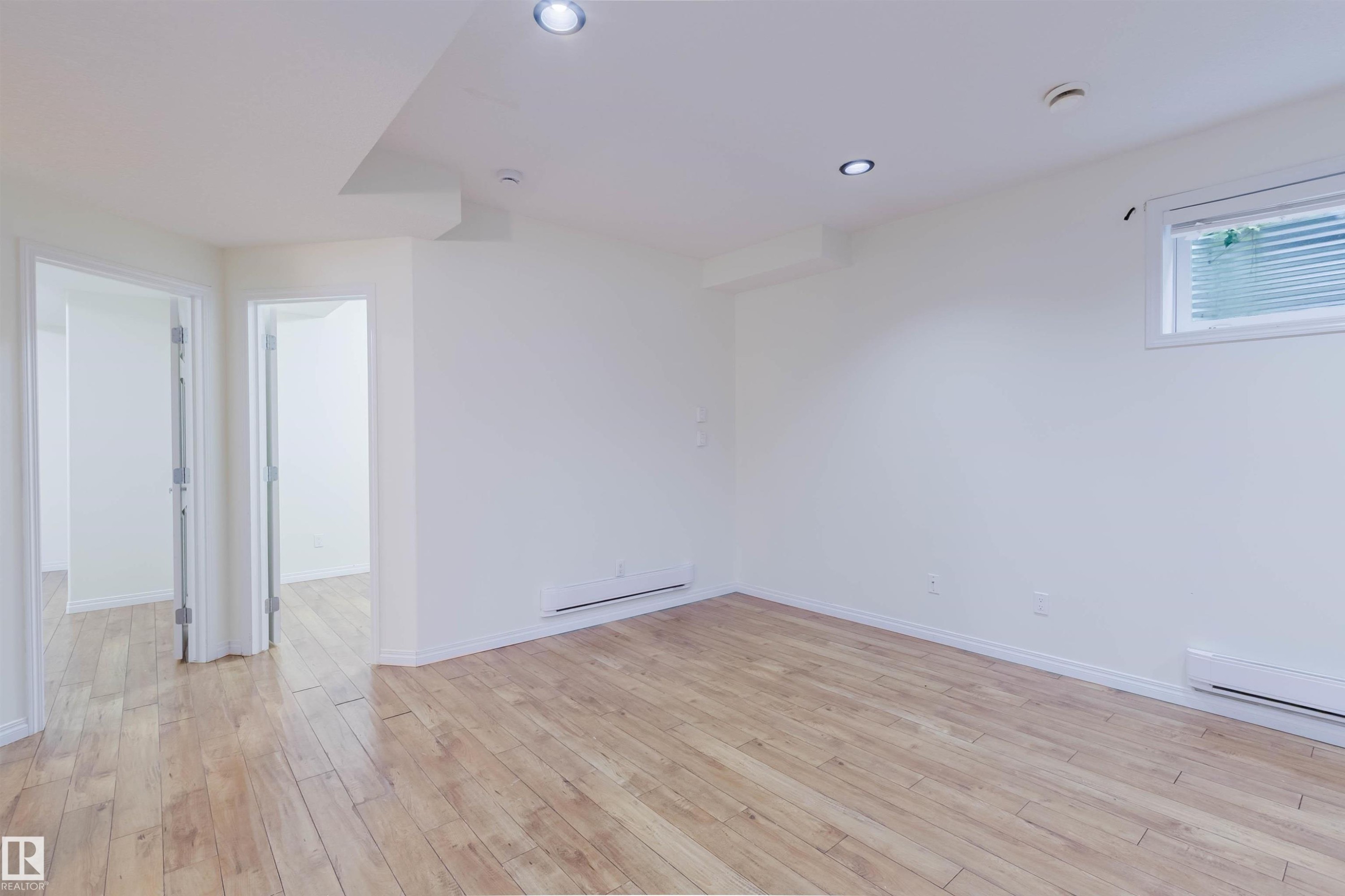 Hardwood-style flooring throughout - 11608 96 Street Nw, Edmonton, AB