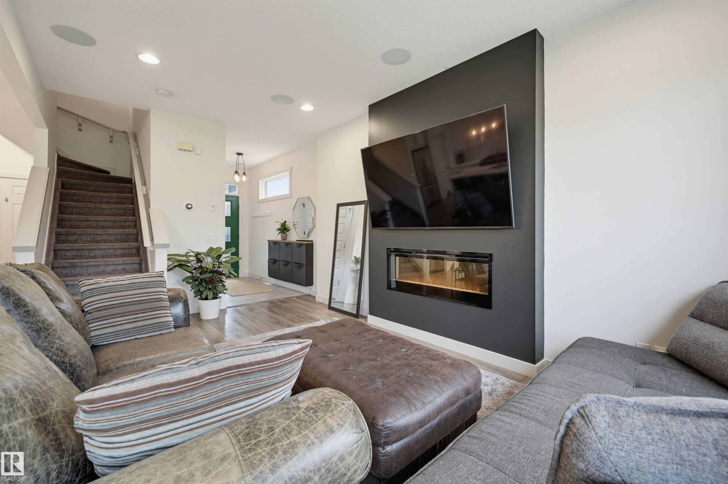 22434 99A Avenue Nw, Edmonton, AB - Indoor Photo Showing Living Room With Fireplace