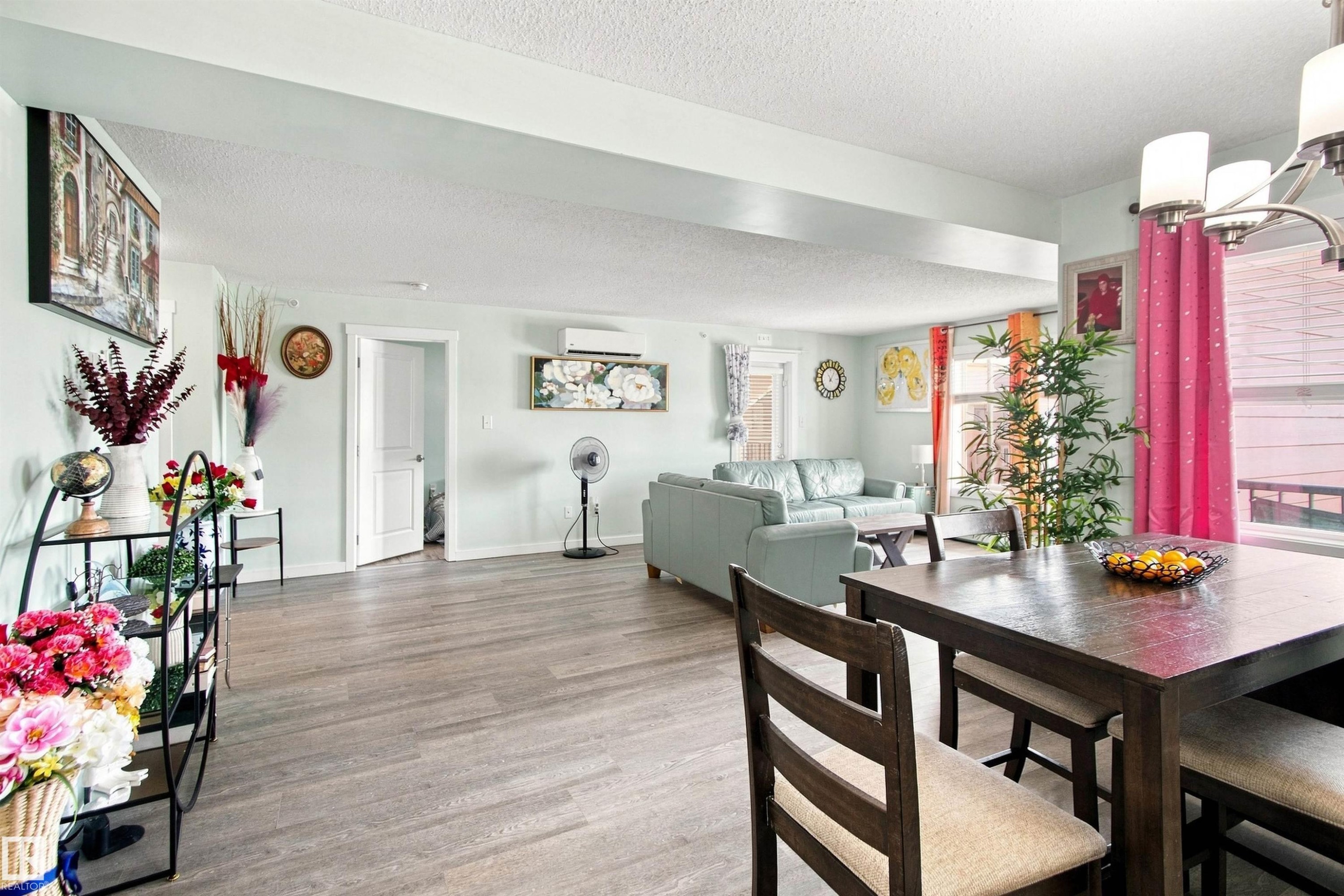 Wood-finish flooring, recessed lighting, and a chandelier-style fixture - #413 18126 77 St Nw, Edmonton, AB