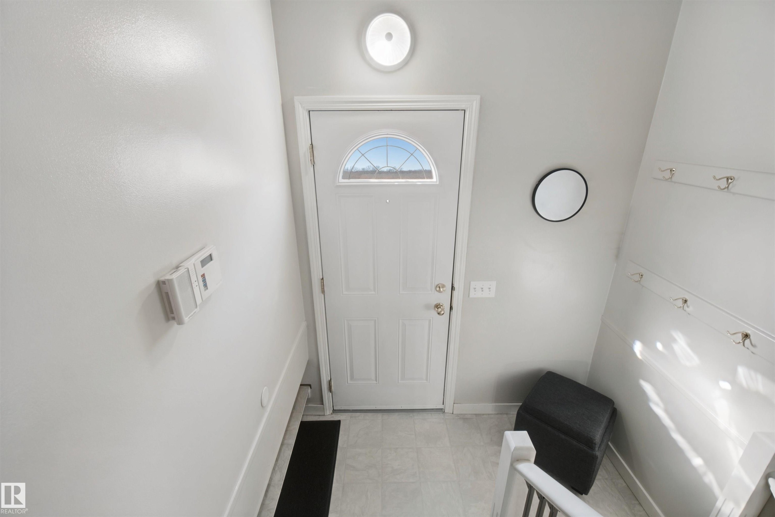 Side / back entryway and stairs to the basement - 11439 144 Avenue Nw, Edmonton, AB