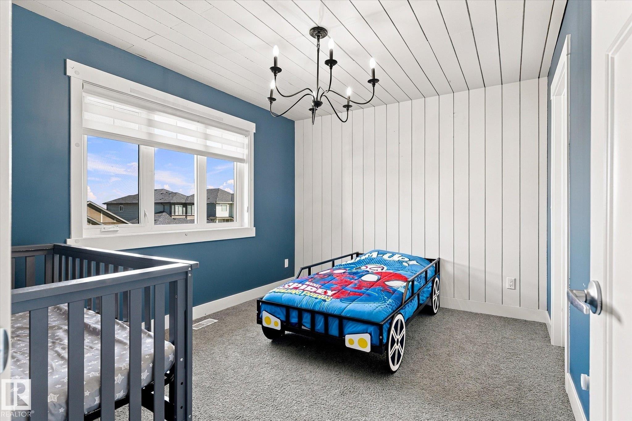 Textured plank ceiling and accent wall - 2011 Genesis Lane, Stony Plain, AB