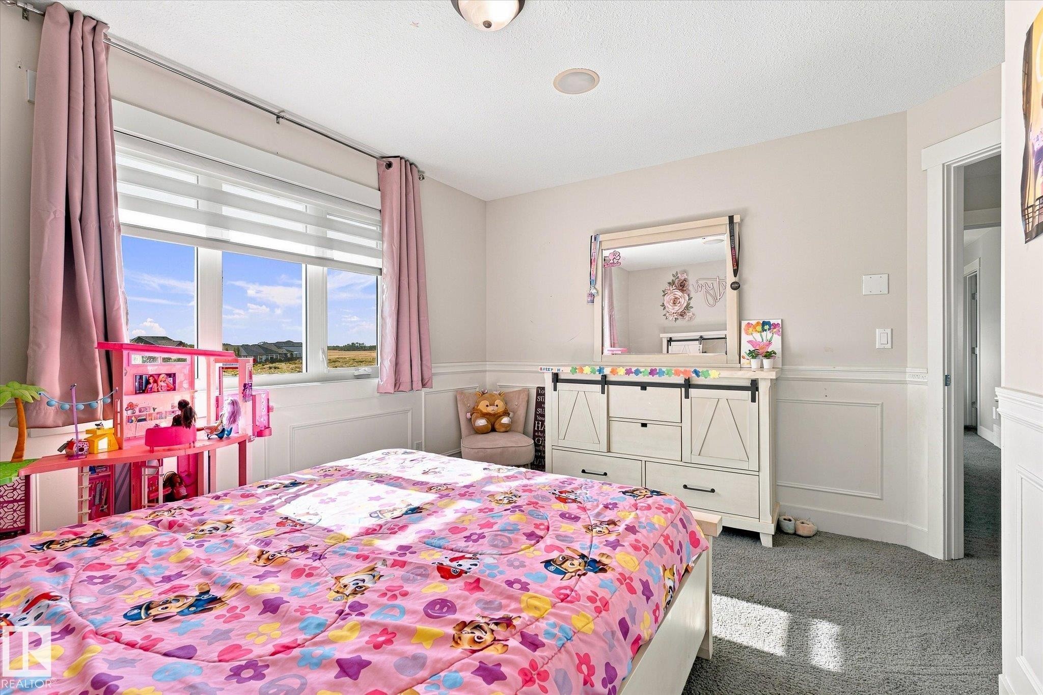 Window with horizontal blinds, decorative wall paneling, flush mount ceiling light, recessed ceiling lighting, and carpet flooring - 2011 Genesis Lane, Stony Plain, AB