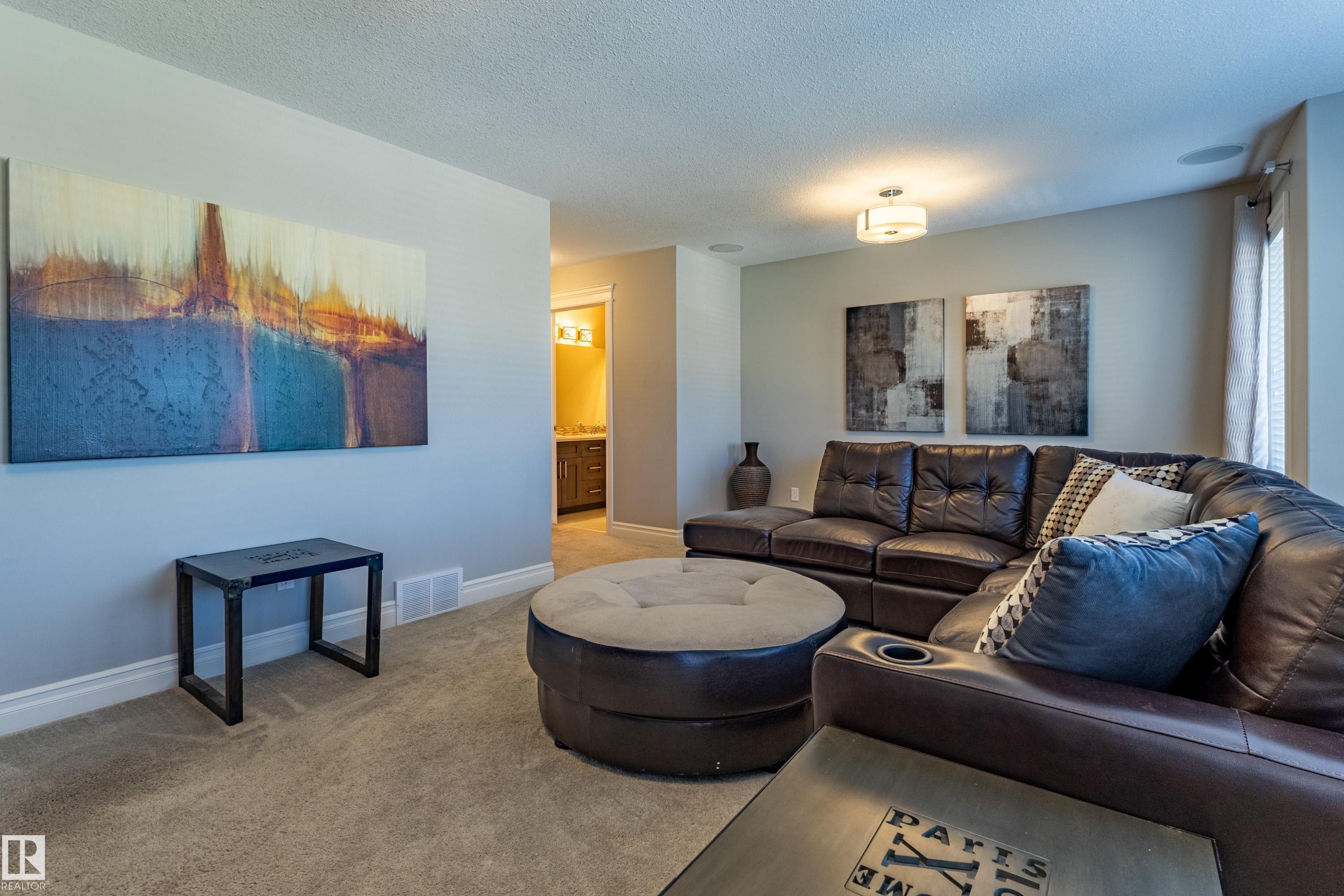 Recessed lighting, ceiling-mounted light fixture, and carpeted flooring - 233 Hawks Ridge Boulevard Nw, Edmonton, AB