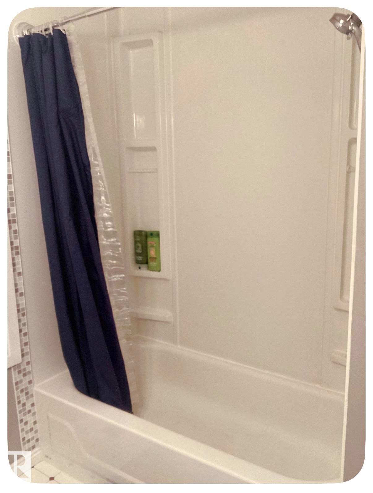 Bathtub and shower combination with integrated shelving - 10649 125 Street Nw, Edmonton, AB
