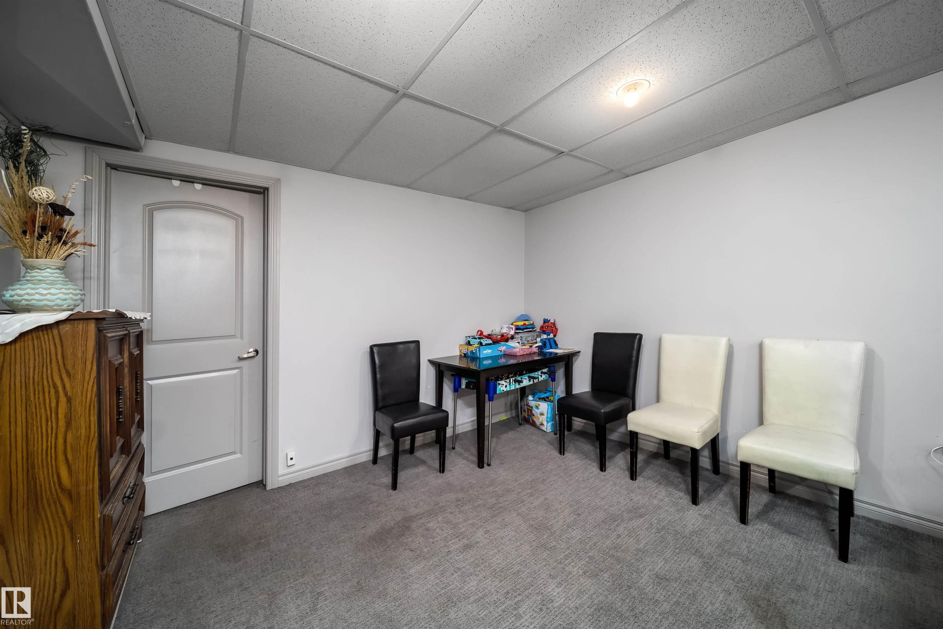 Recessed lighting, light gray walls, gray carpet flooring, white paneled door, drop ceiling - 10245 160 Street Nw, Edmonton, AB