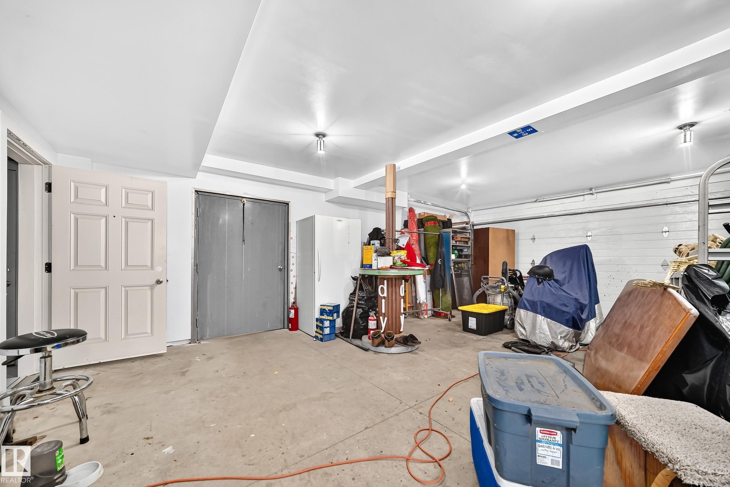 One Bay of 3 Car Detached Garage - Fire Door Between the 2 Car and ONE Car Sections. - 12045 64 Street Nw, Edmonton, AB