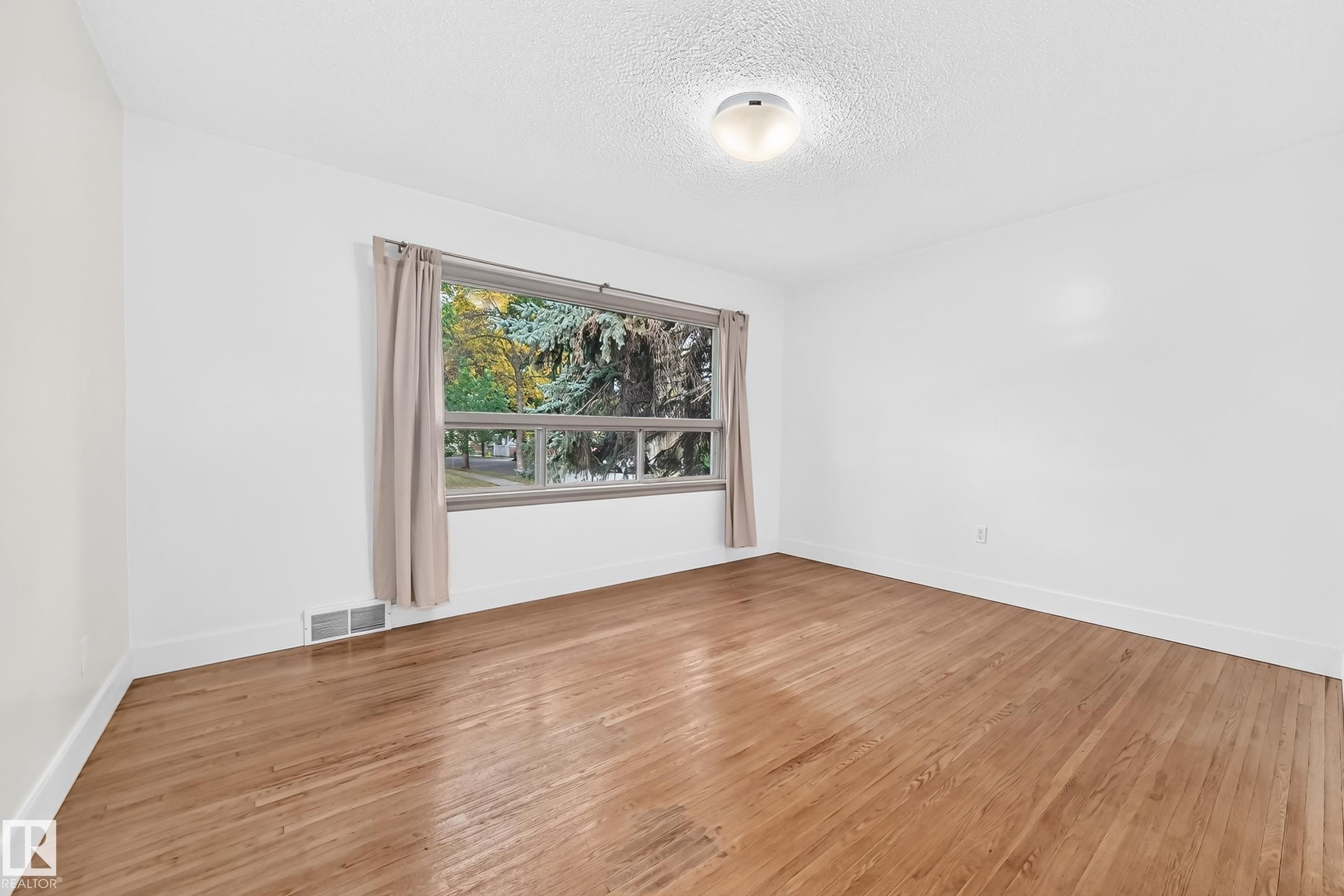 One of 2 Main Floor Bedrooms - 12045 64 Street Nw, Edmonton, AB