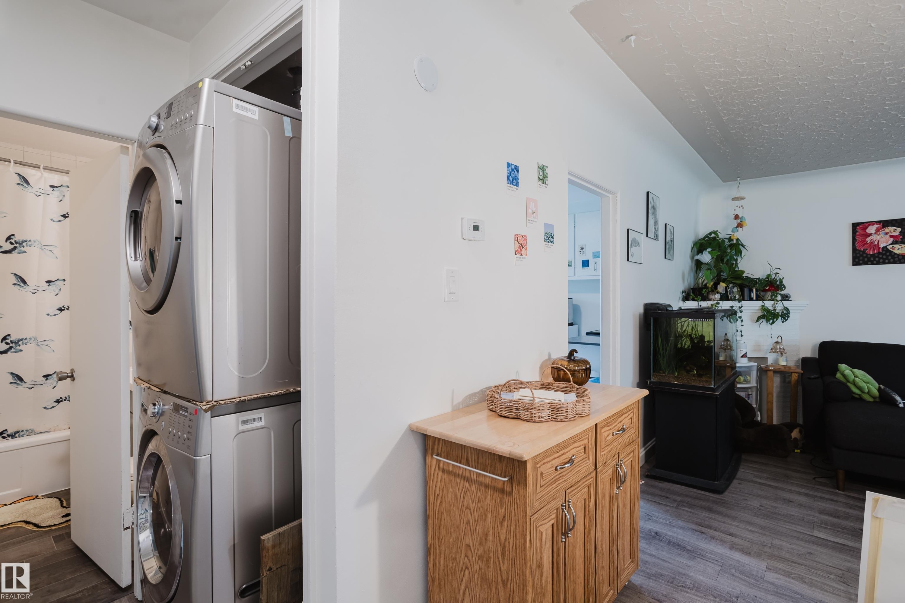 Stacked front-load laundry appliances - 11134 11138 116 Street Nw, Edmonton, AB