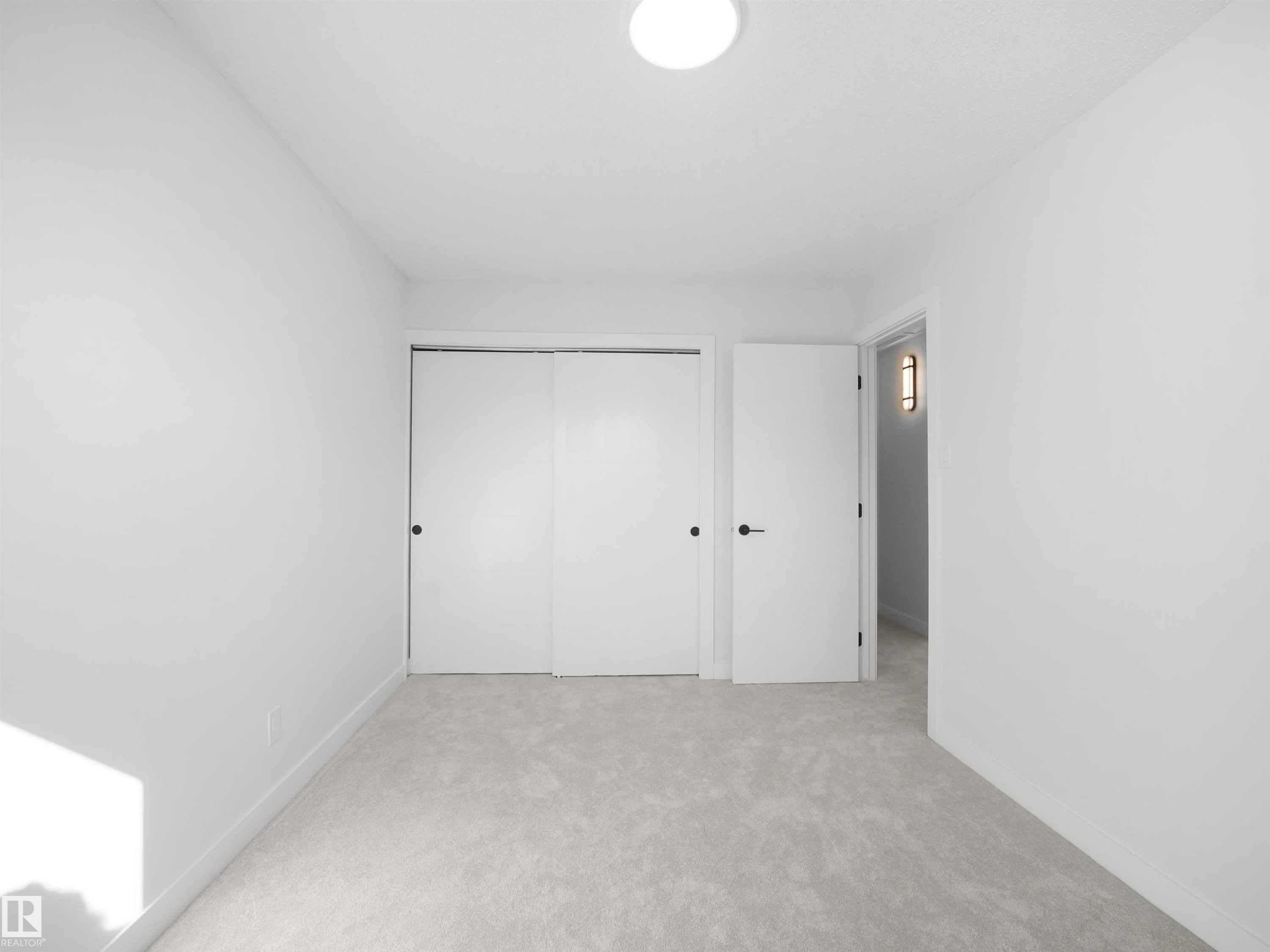 Light gray carpeting and white painted walls - 12C Twin Terrace Nw, Edmonton, AB