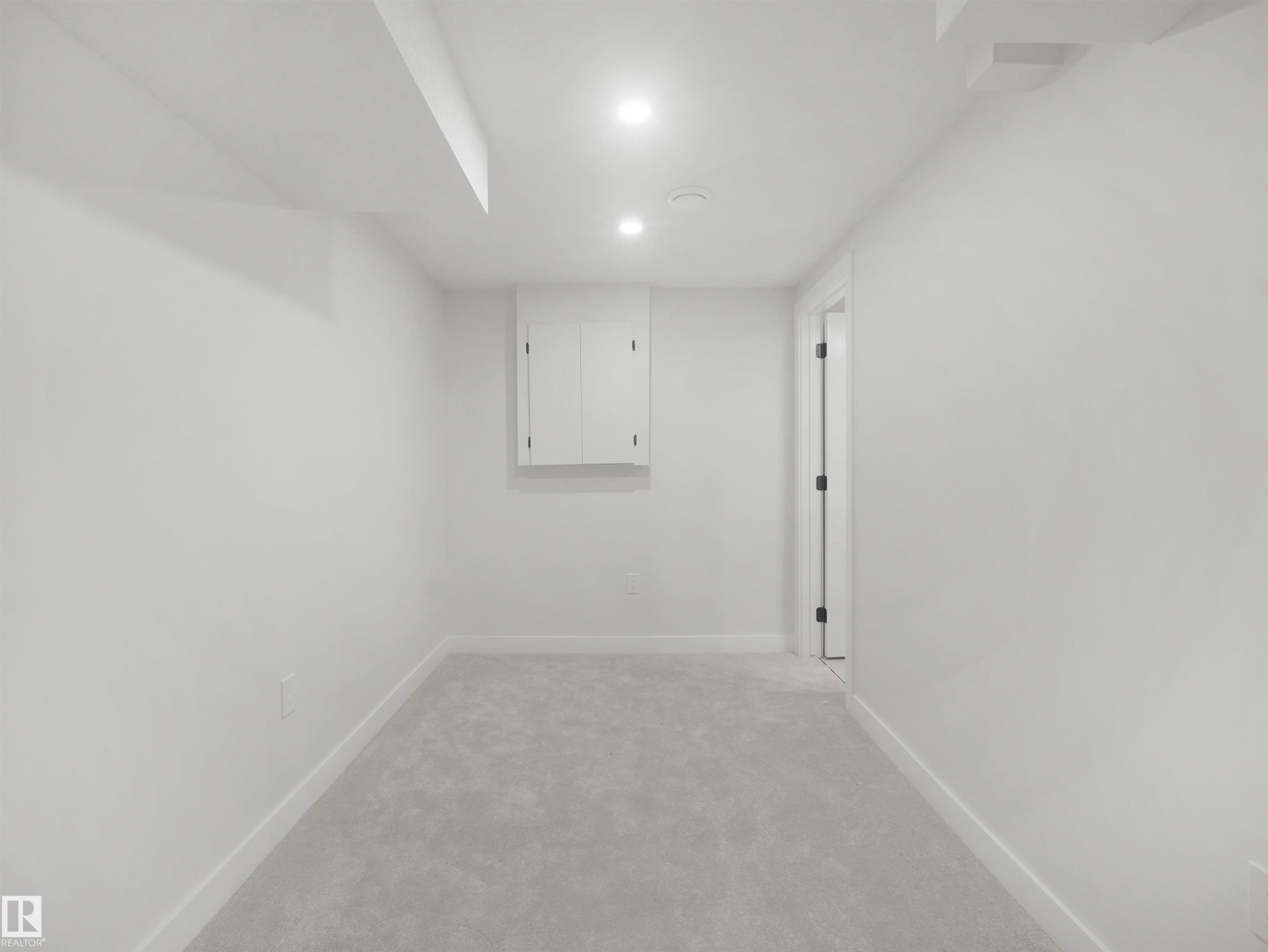 Recessed lighting, wall-mounted cabinetry, soft gray carpeting, and white trim - 12C Twin Terrace Nw, Edmonton, AB