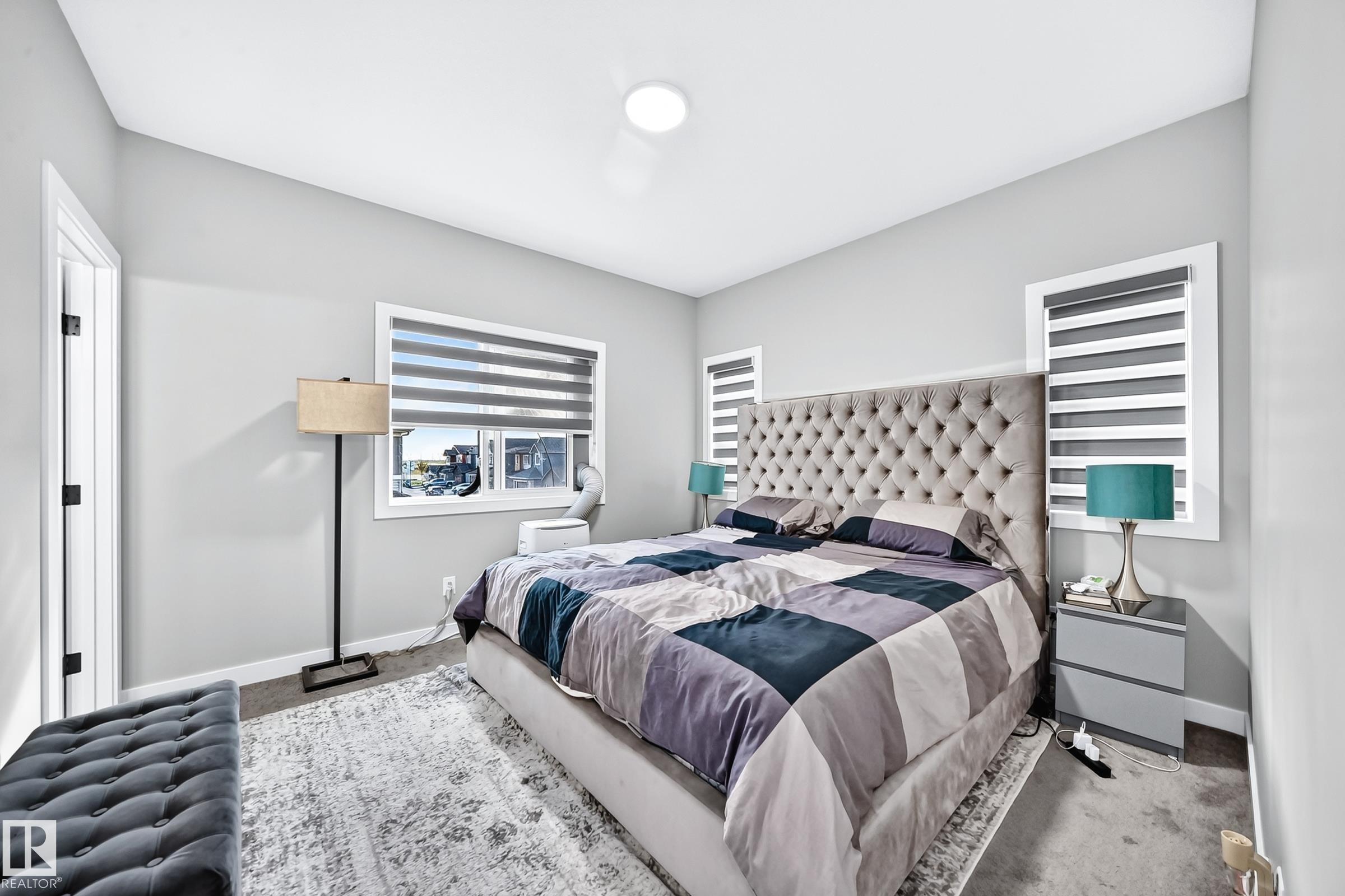 Recessed ceiling lighting, white window trim, and light gray wall paint - 2415 194 Street Nw, Edmonton, AB