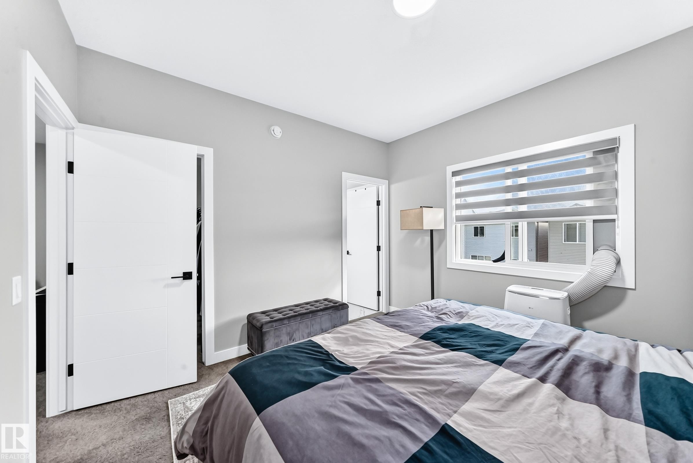 White interior doors with black hardware - 2415 194 Street Nw, Edmonton, AB