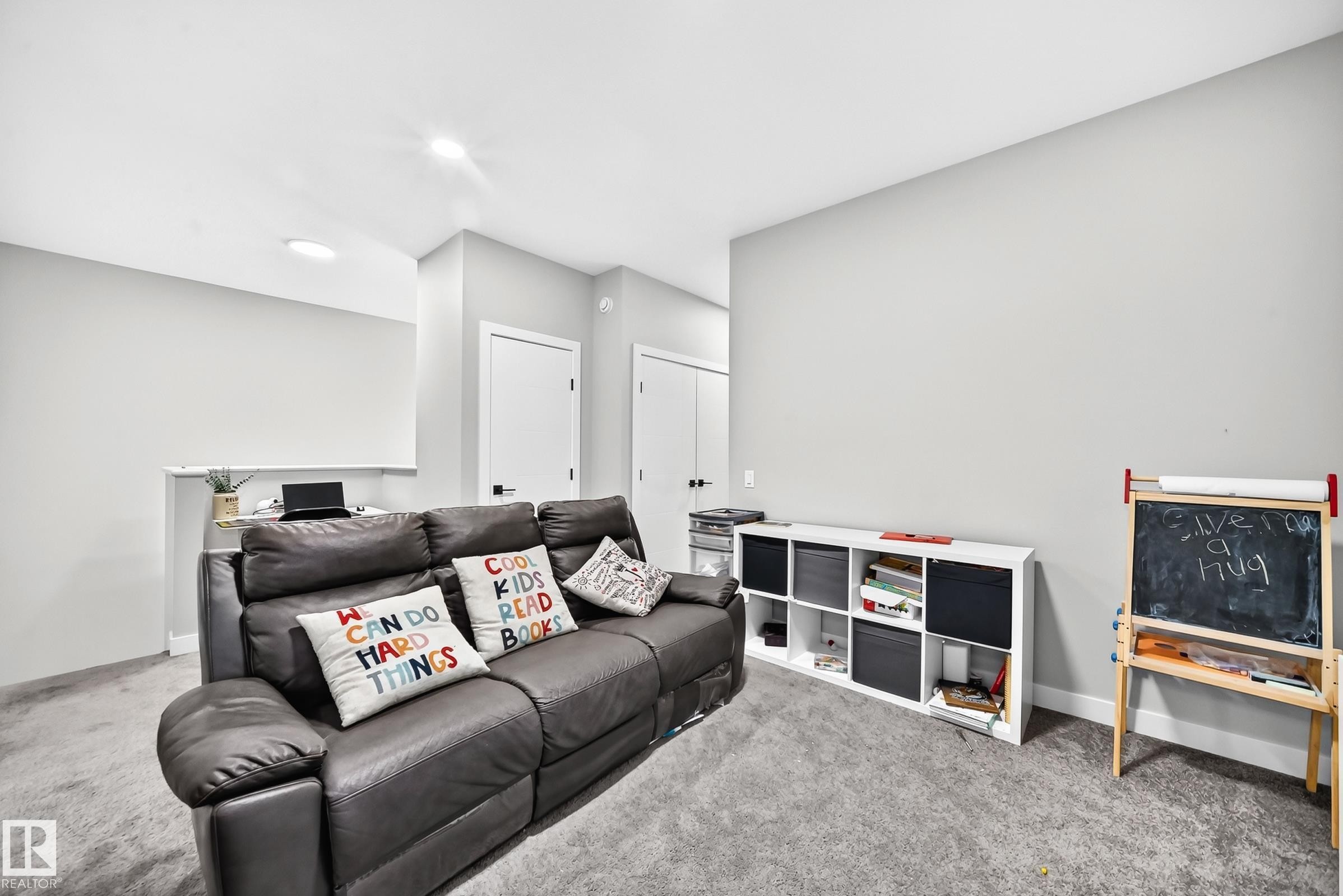 Light gray wall paint, recessed lighting, and white trim - 2415 194 Street Nw, Edmonton, AB