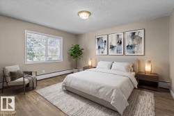#301 11465 41 AV NW Edmonton, AB T6J 0T9