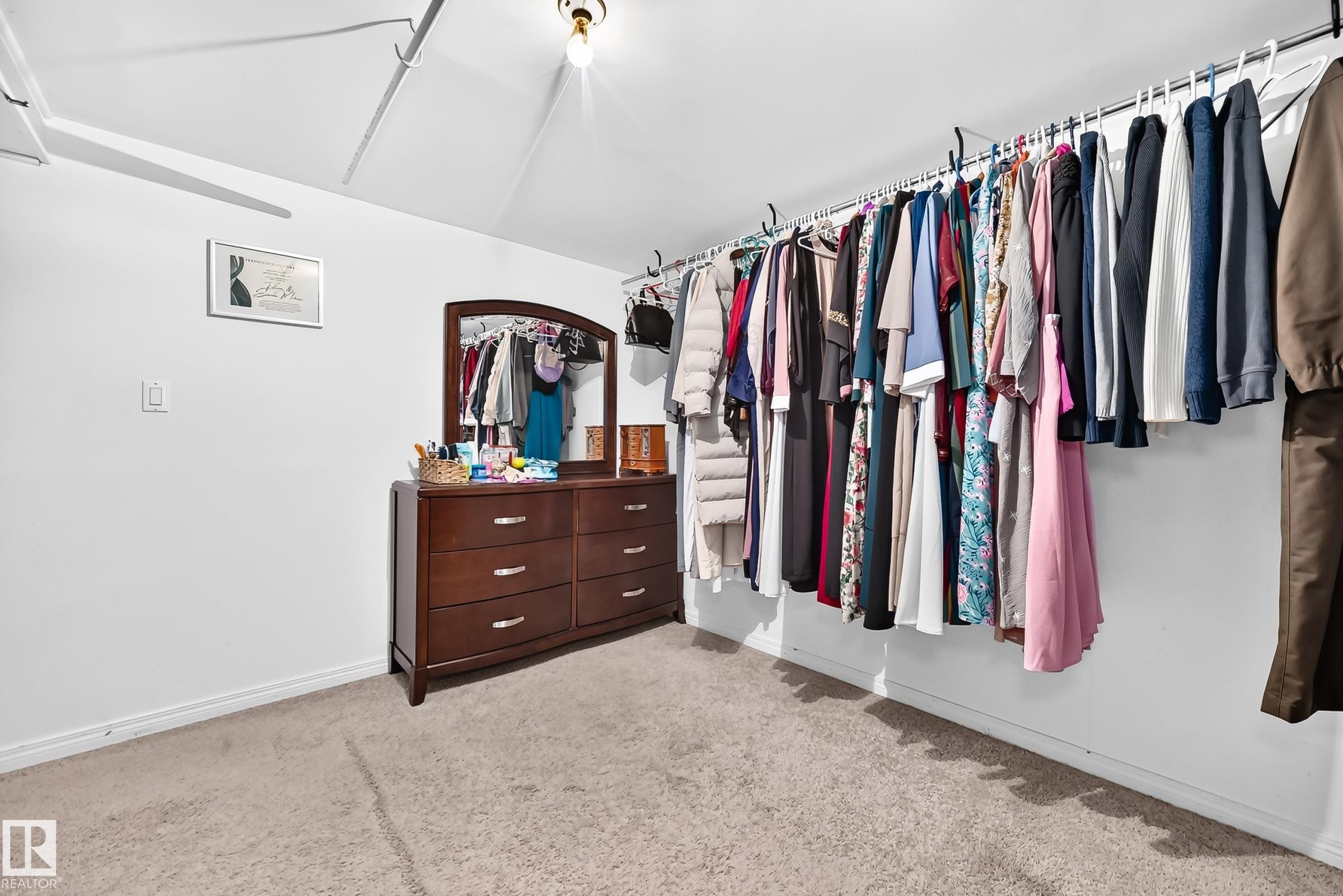 Carpeted flooring, white painted walls, and ceiling-mounted lighting - 11007 173A Avenue Nw, Edmonton, AB
