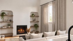 Built-in electric fireplace with a black trim, flanked by arched alcoves with wood-finish shelving - 