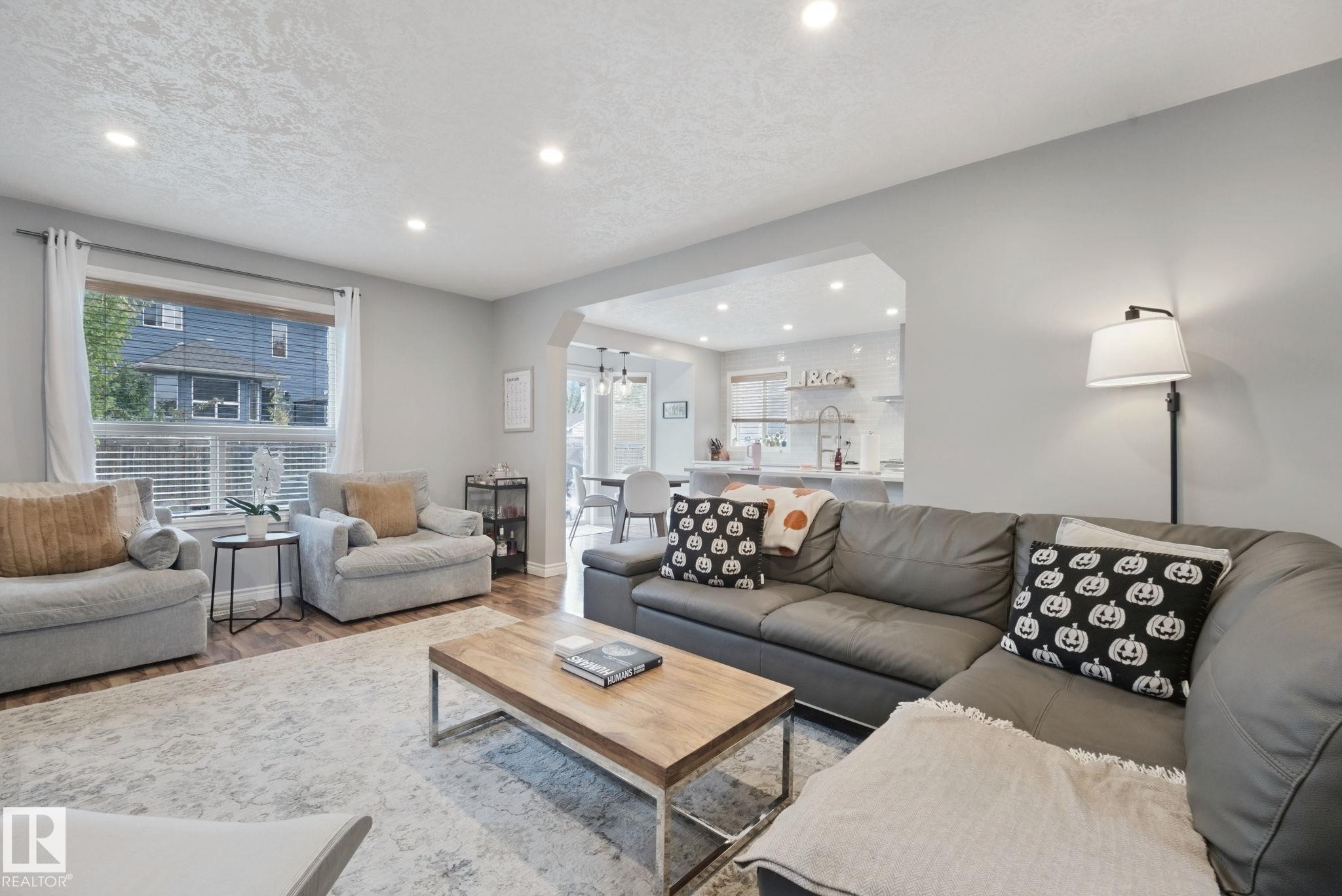 Recessed ceiling lighting, wood-finish flooring, and an arched entryway - 324 Ascott Crescent, Sherwood Park, AB