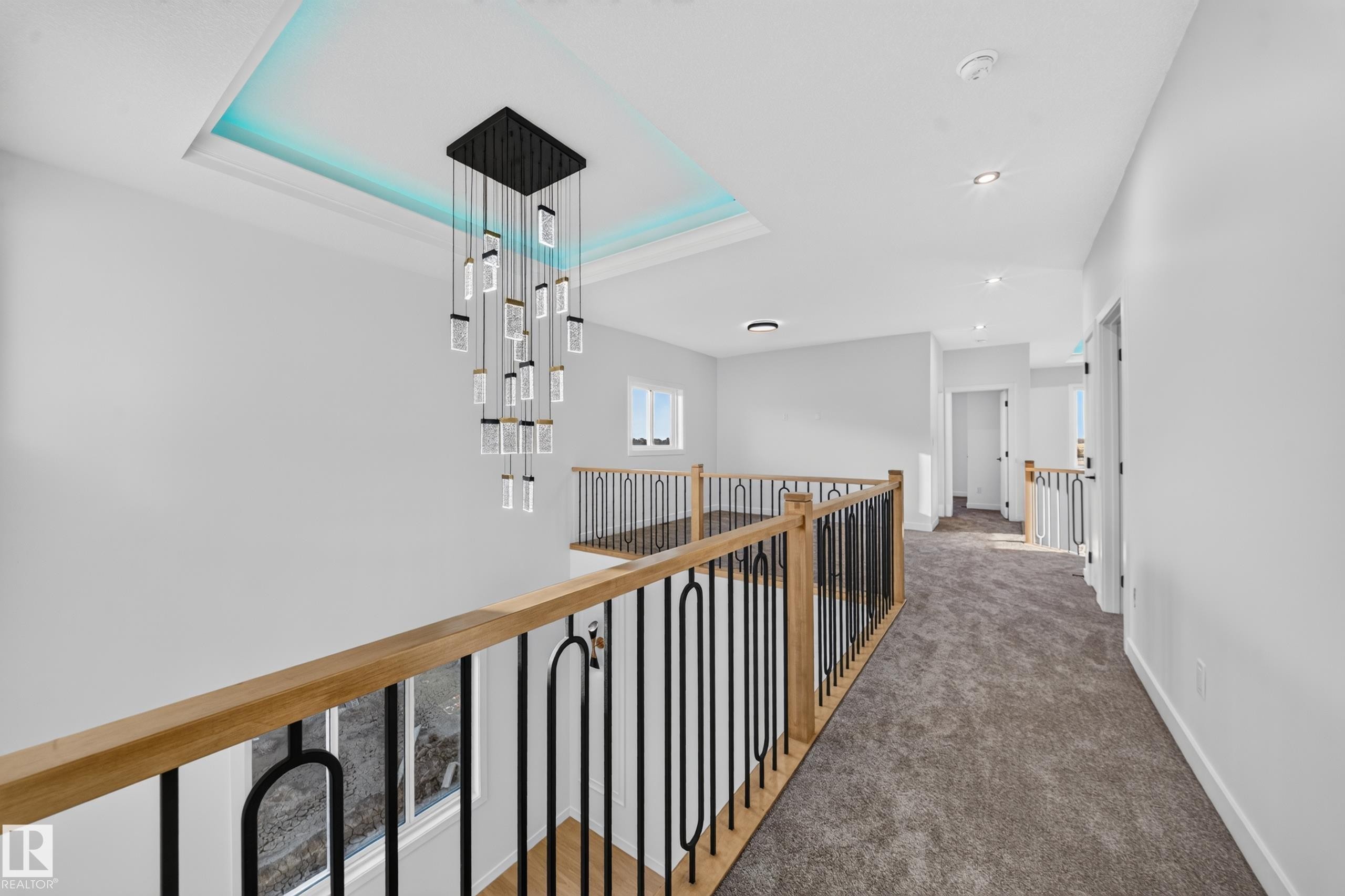 Modern chandelier with tray ceiling and accent lighting - 13024 186 Avene Nw, Edmonton, AB