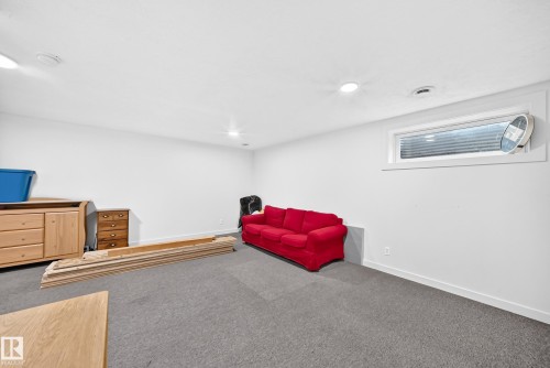 Recessed lighting, wall-to-wall carpeting, and a horizontal window with blinds - #27 287 Macewan Rd Sw, Edmonton, AB 